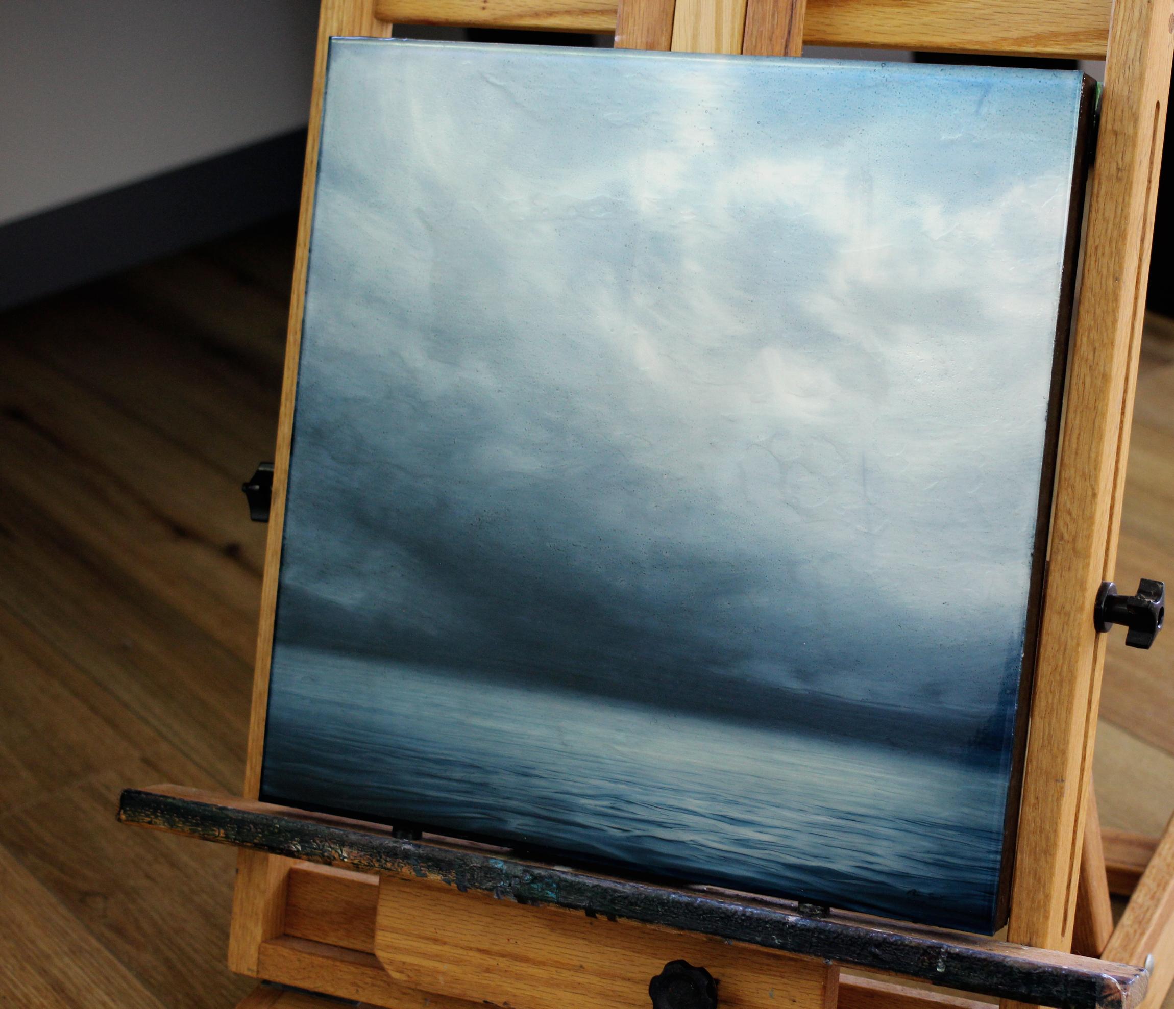 <p>Artist Comments<br /> In late winter I took a trip down to Coeur d'Alene. The atmosphere was stunning, giant clouds lifting from the lake to expose water fading into darkness while the light above was blindingly brilliant. I am pretty obsessed