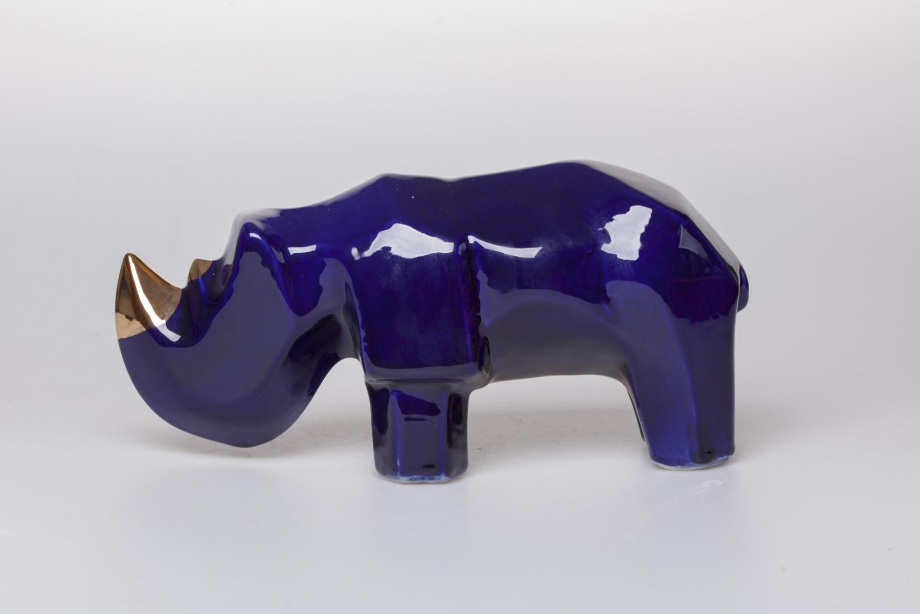 Blue rhino - XXI century, Figurative animal sculpture, Ceramic - Other Art Style Sculpture by Jakub Niewdana