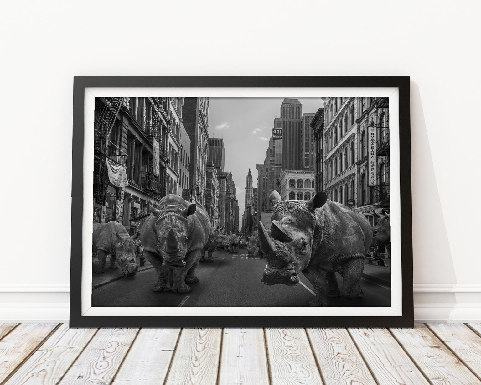 Title: Rhinos at home in New York
Limited Edition Photographic Print

Limited-Edition Illustration Print Artwork titled ‘Rhinos at home in New York’ by artists Gillie and Marc. This is a realistic juxtaposed artwork available in limited-edition