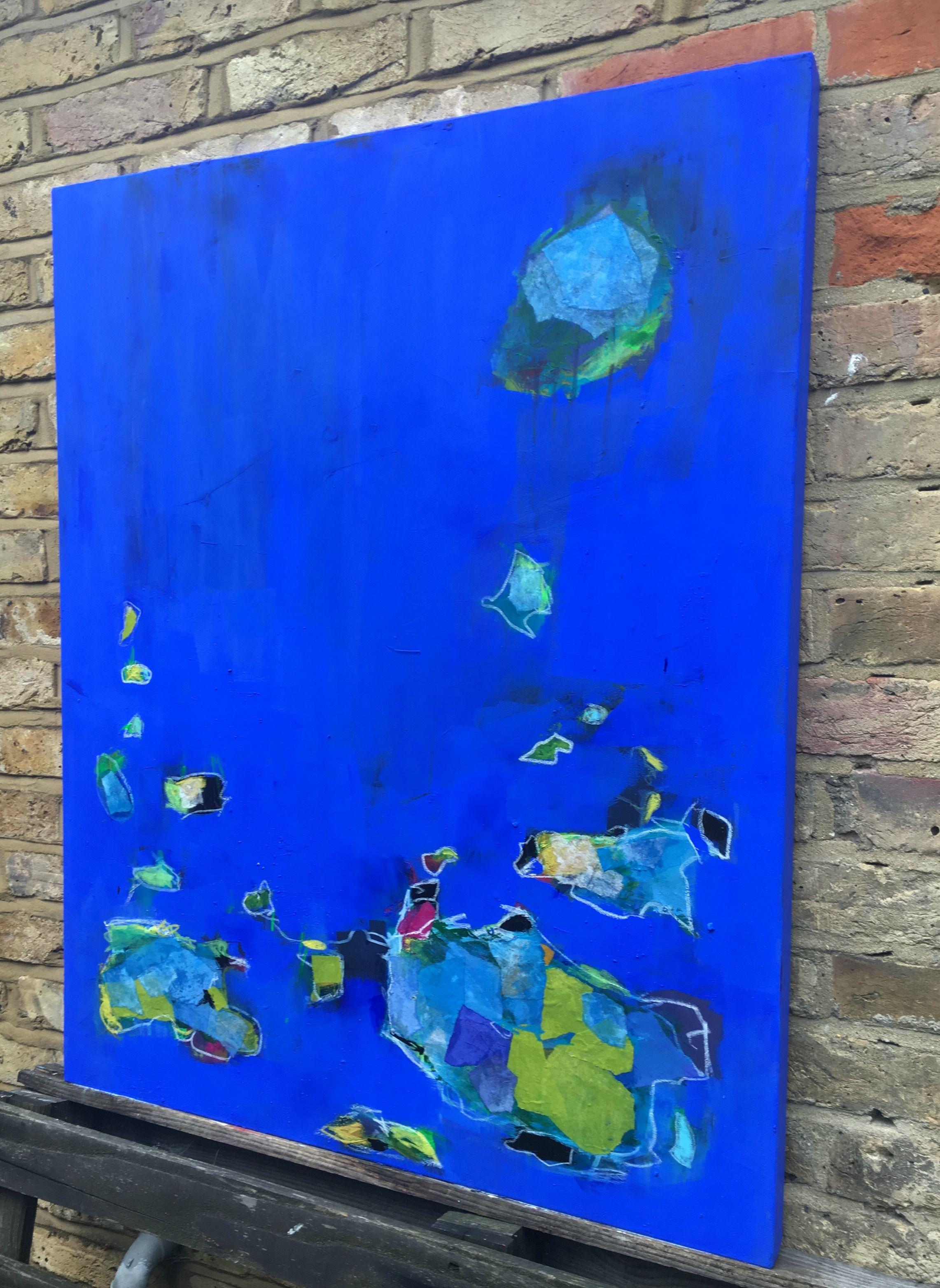 'Into the Deep' is a large, abstract collage painting that will be a striking statement piece in any room. The wonderful deep ultramine blue and in this contemporary colour field painting was mixed with artist pigments. The pigments were mixed to a