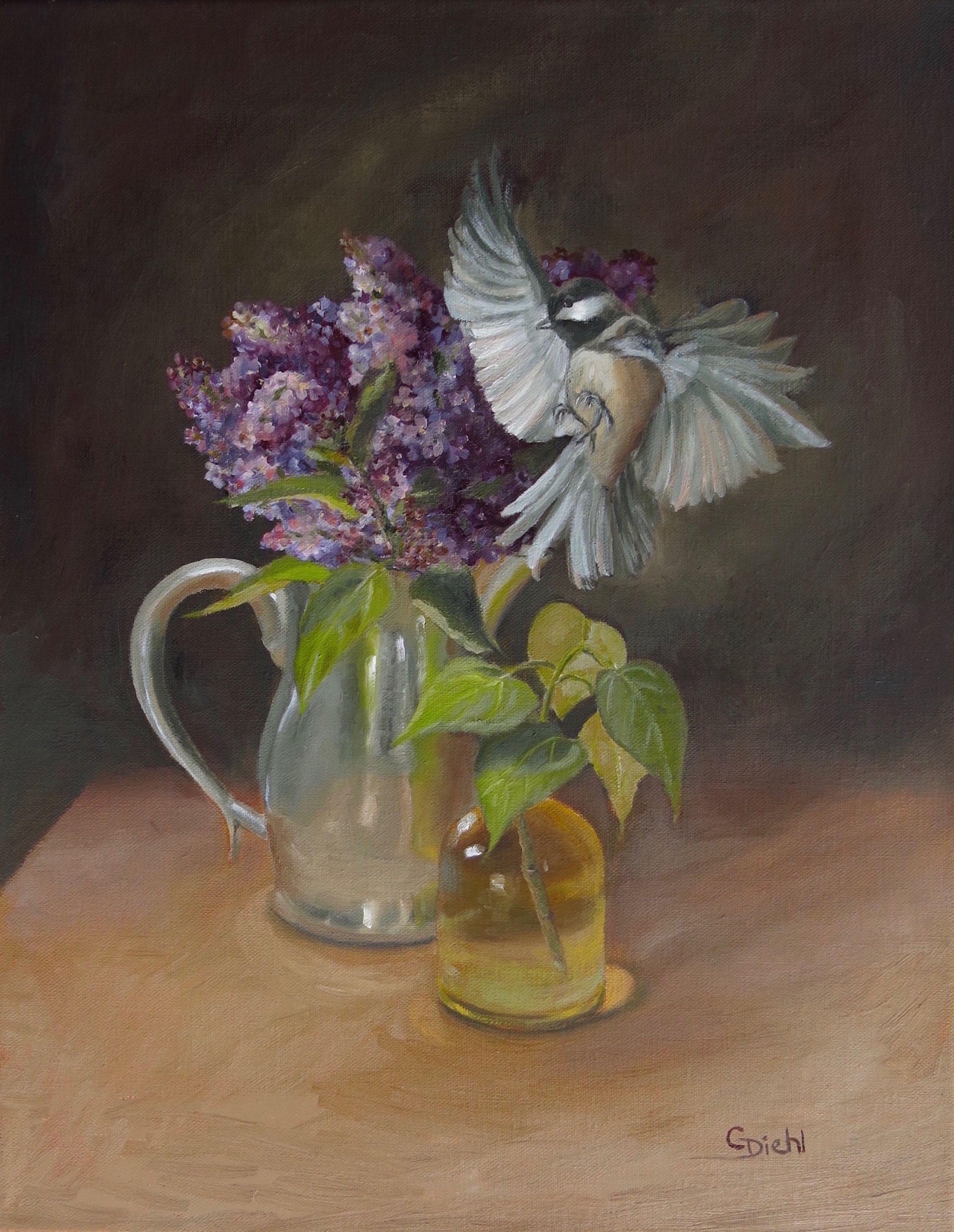 A bird in flight can be seen flying over the still life of objects containing ivy and a lilac floral. This fine art piece has been created in the realism style on a 11"x14" linen canvas. The frame measures 17"x20" and is wired for hanging. Please