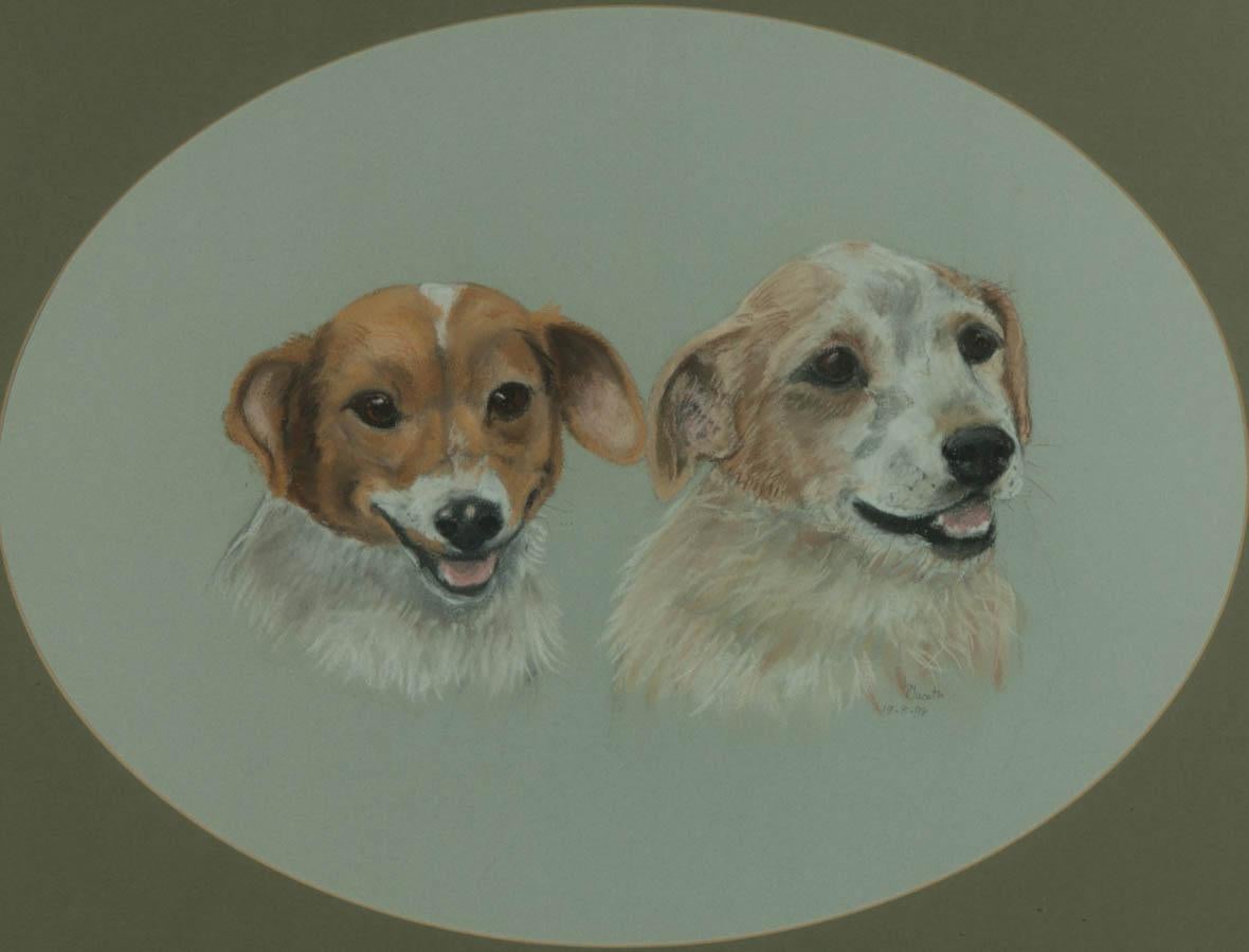 A delightful and delicate pastel portrait of two terriers well presented in a wooden frame with a gilt inner border. The artwork is mounted in an oval olive mountboard.

Attached to the glazing is an engraved gold sticker stating the artist's name