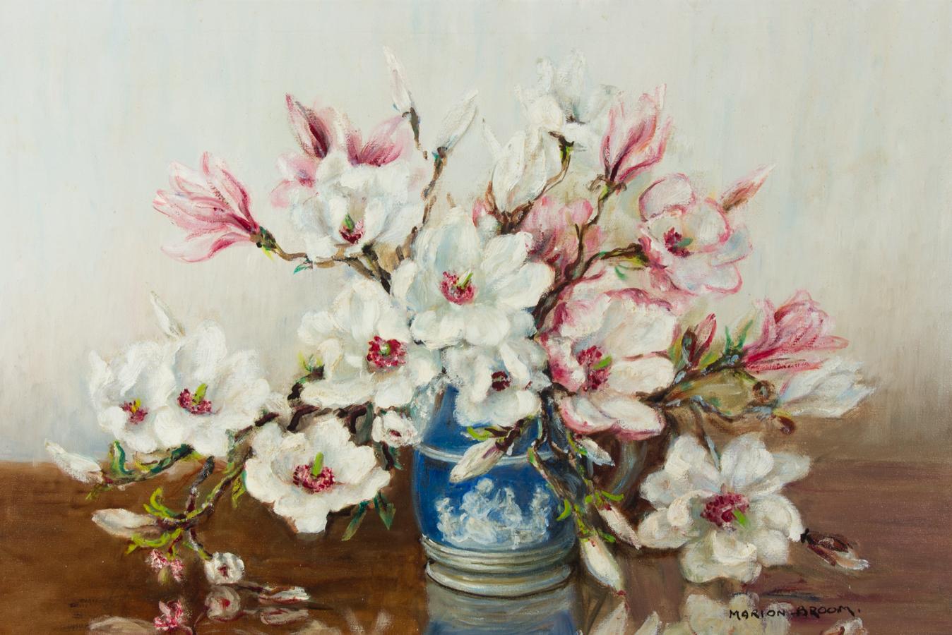 A stunning still life from well listed artist Marion Broom (1878-1962), depicting flowering magnolia branches in a fine blue vase. Broom has used expressive brush marks and areas of impasto to create a depth to her composition. The pastel shades are