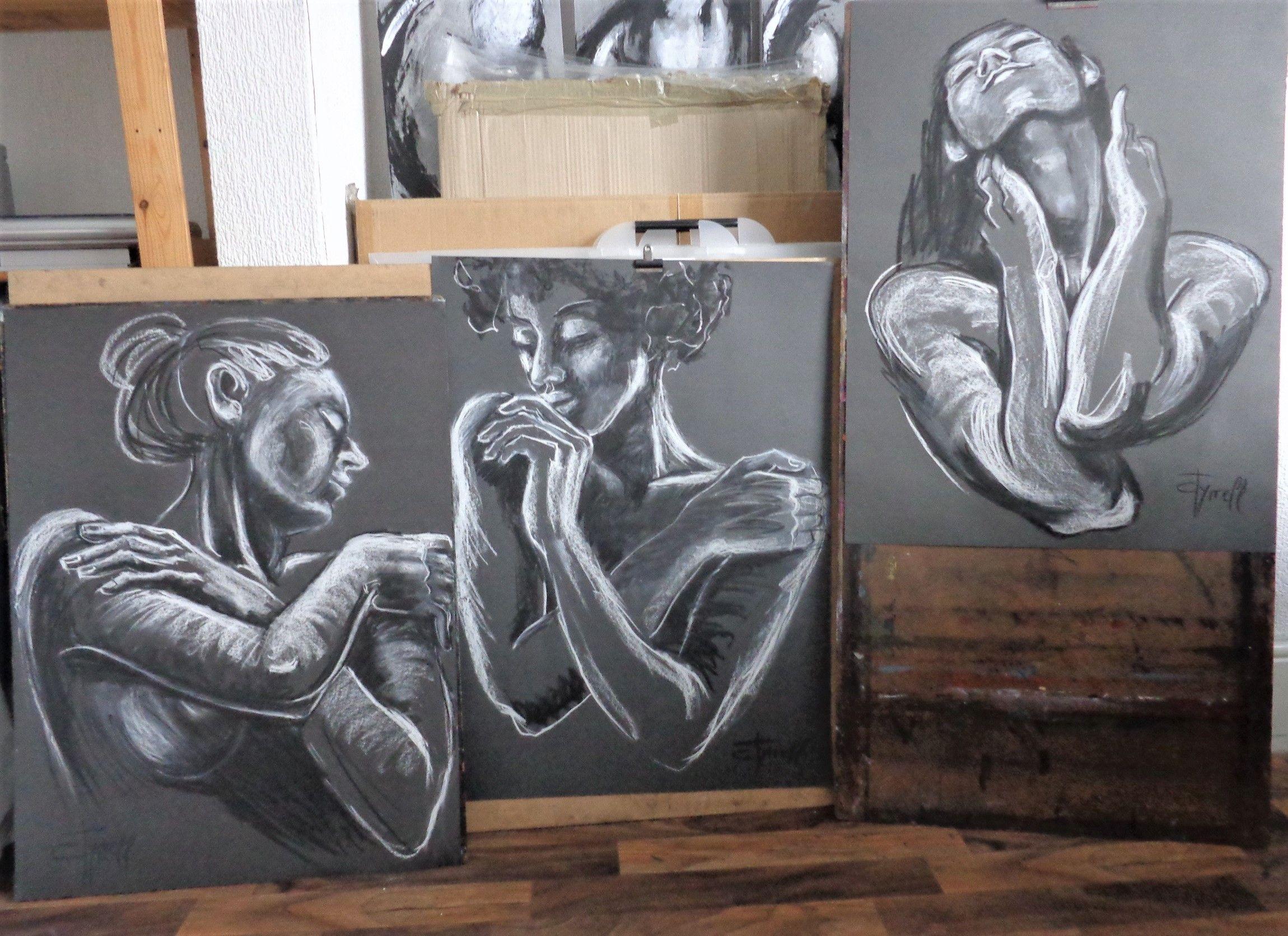 Original contemporary figurative charcoal and white pastel drawing on black paper, unframed. New series of monochrome modern and spontaneous portrait drawings of women expressing feelings and moods. Image of a romantic woman with crossed arms, moved