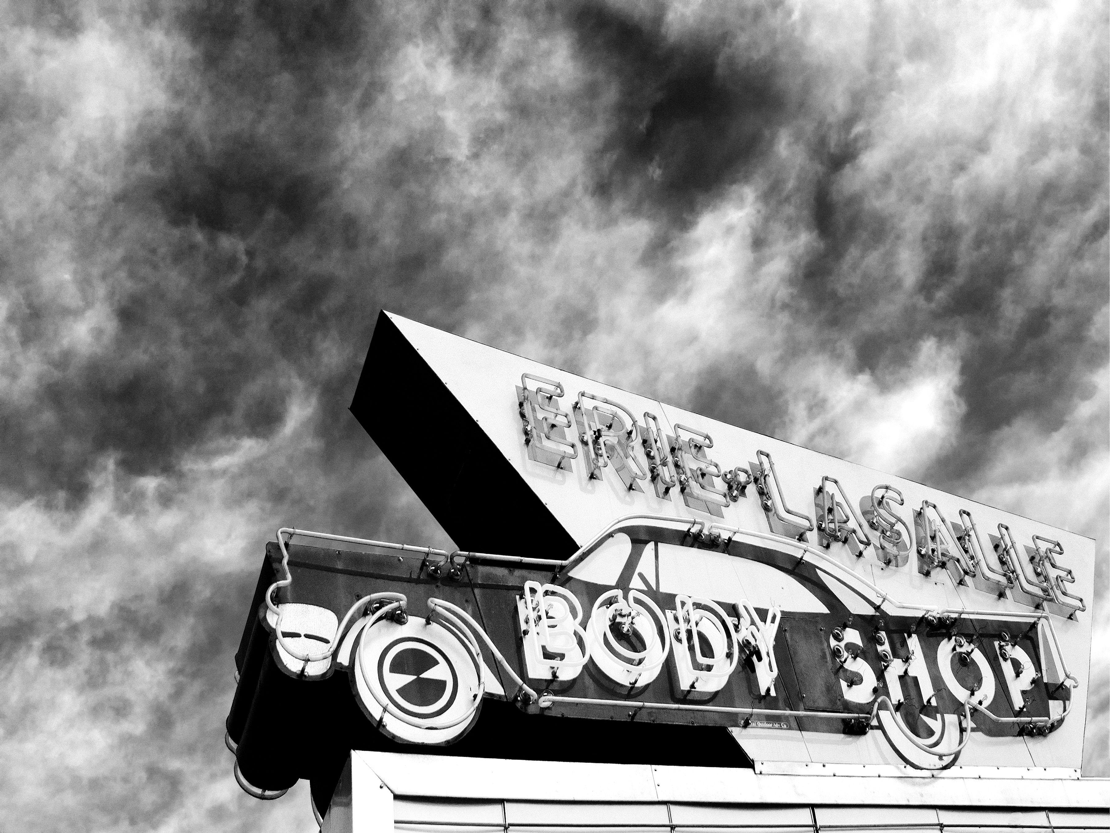 William Dey Black and White Photograph - AUTO FOCUS Auto Body Shop, Photograph, C-Type