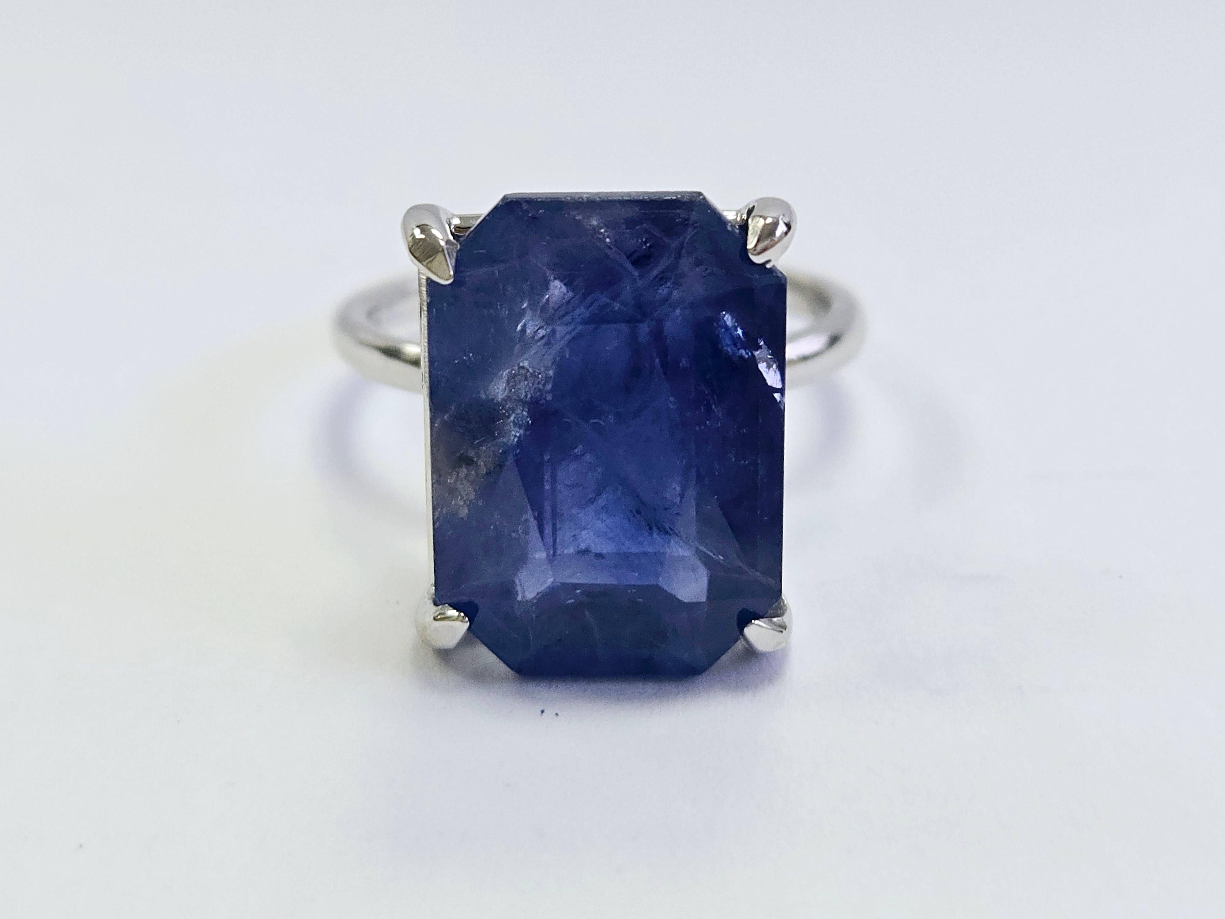 Exquisite 12.34 Carat Radiant Cut Natural Sapphire Ring in 14K White Gold

Indulge in the brilliance of this remarkable natural sapphire ring, featuring a stunning 12.34 -carat Radiant Cutsapphire set in a luxurious 14K white gold band. The vibrant