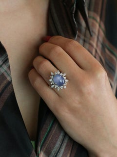 12.34 ct Ceylan Cabochon Star sapphire and diamond cluster ring