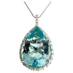 123.44 Carat Blue Topaz Oval Cut & Diamond Fashion Pendant in 18k White Gold