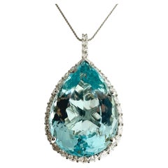 123.44 Carat Blue Topaz Oval Cut & Diamond Fashion Pendant in 18k White Gold 