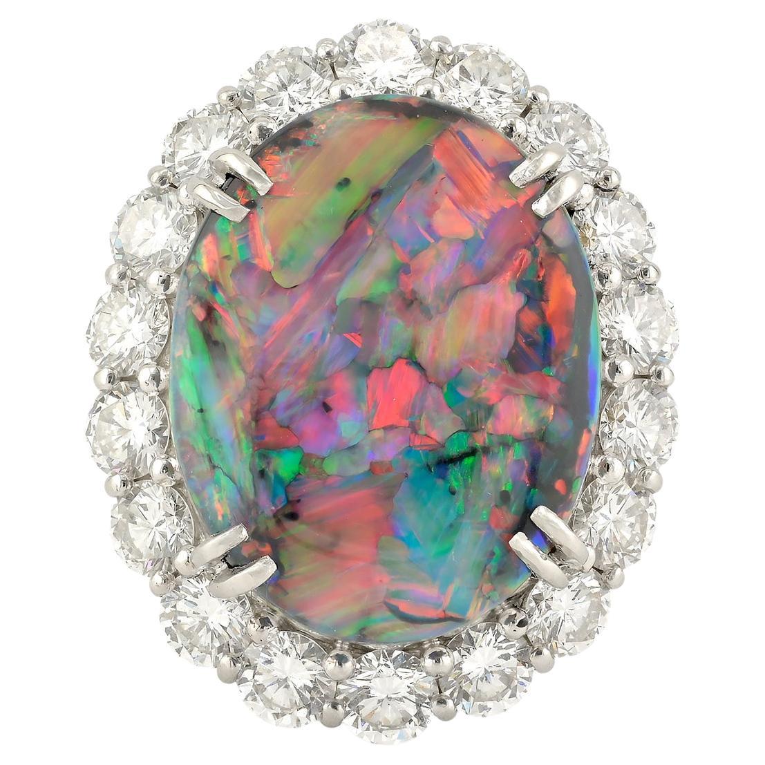 12,35ct Schwarzer Opal & 3,08ct Diamant Halo Ring in Platin