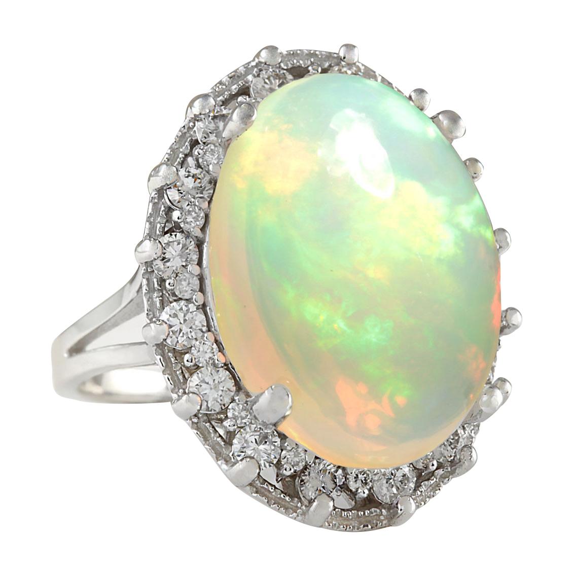 Stamped: 14K White Gold
Total Ring Weight: 8.0 Grams
Total Natural Opal Weight is 11.36 Carat (Measures: 20.00x15.00 mm)
Color: Multicolor
Total Natural Diamond Weight is 1.00 Carat
Color: F-G, Clarity: VS2-SI1
Face Measures: 24.50x19.50 mm
Sku: