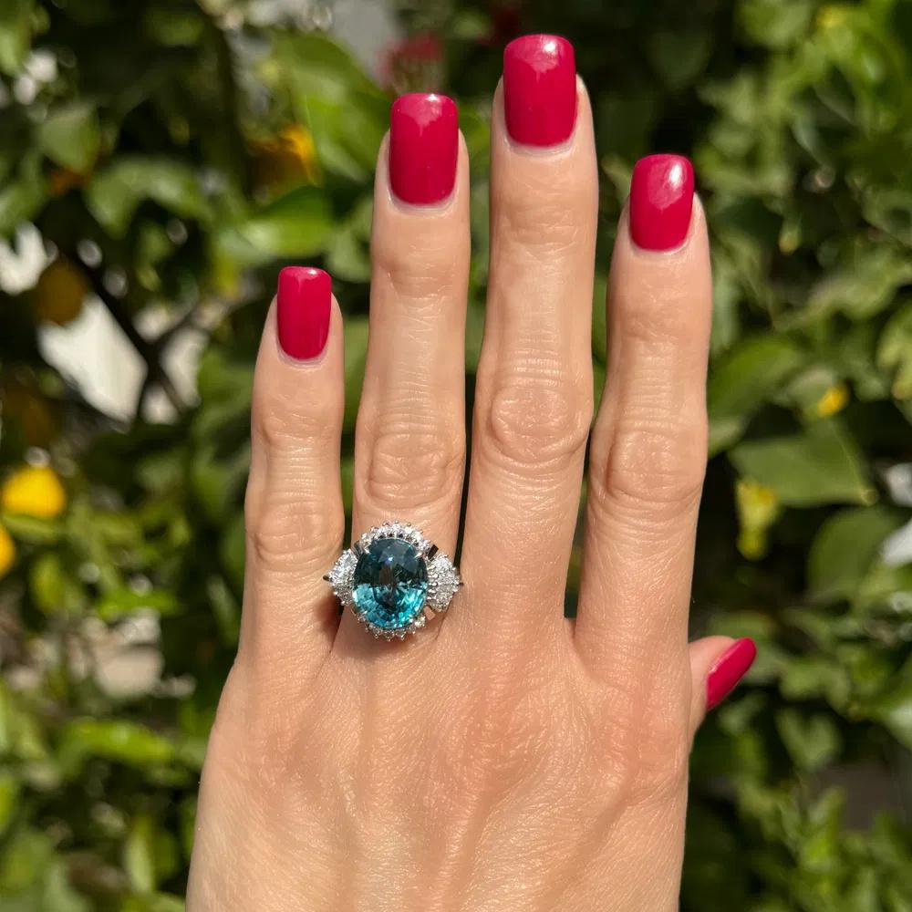 Modernist 12.36 Carat Oval Blue Zircon and Diamond Statement Cocktail Ring For Sale