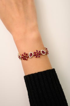 12.37 CTW Floral Ruby & Diamond Bracelet with Pear Cut Rubies in 18K Yellow Gold