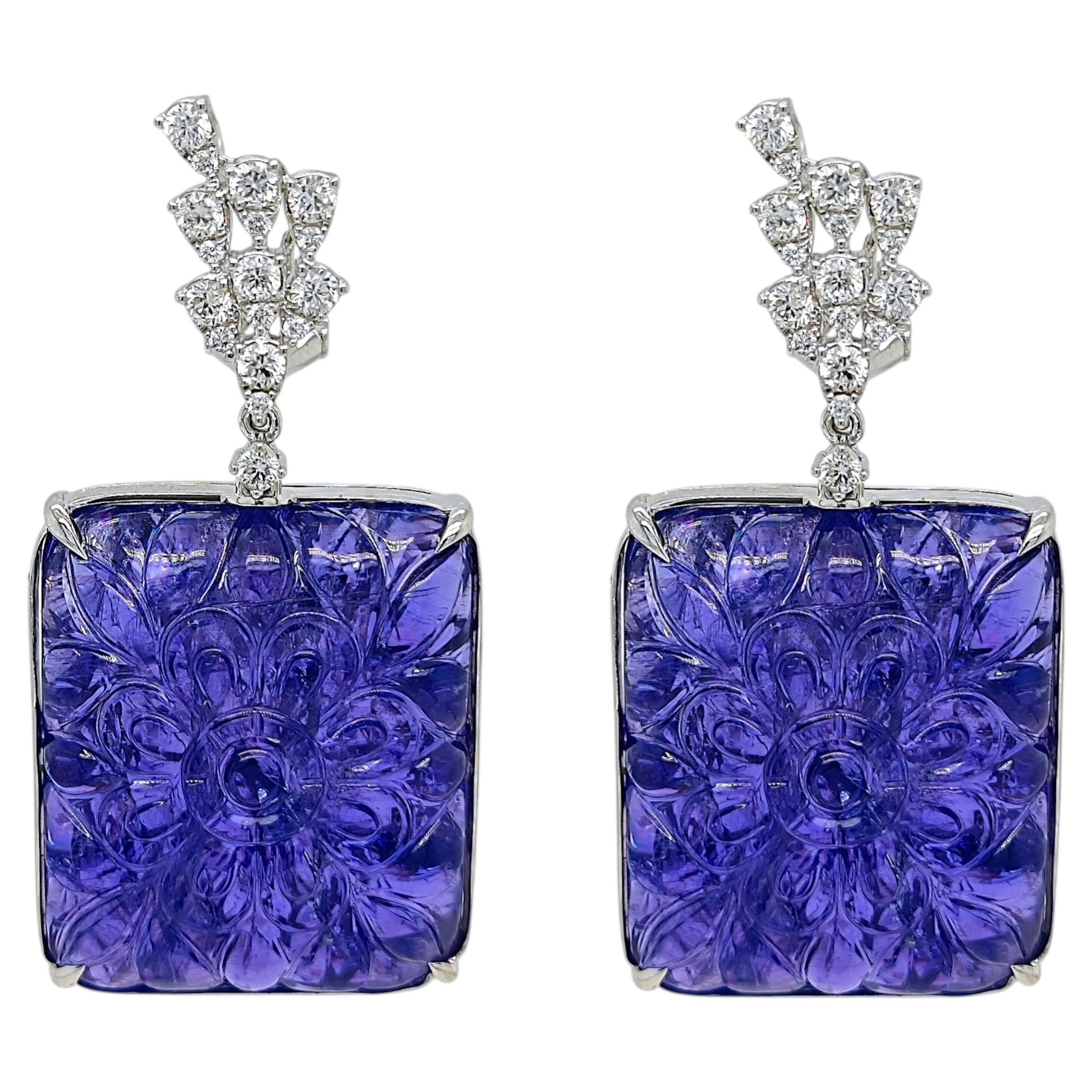 Orecchini in oro bianco con diamante tondo e tanzanite da 123,86 carati