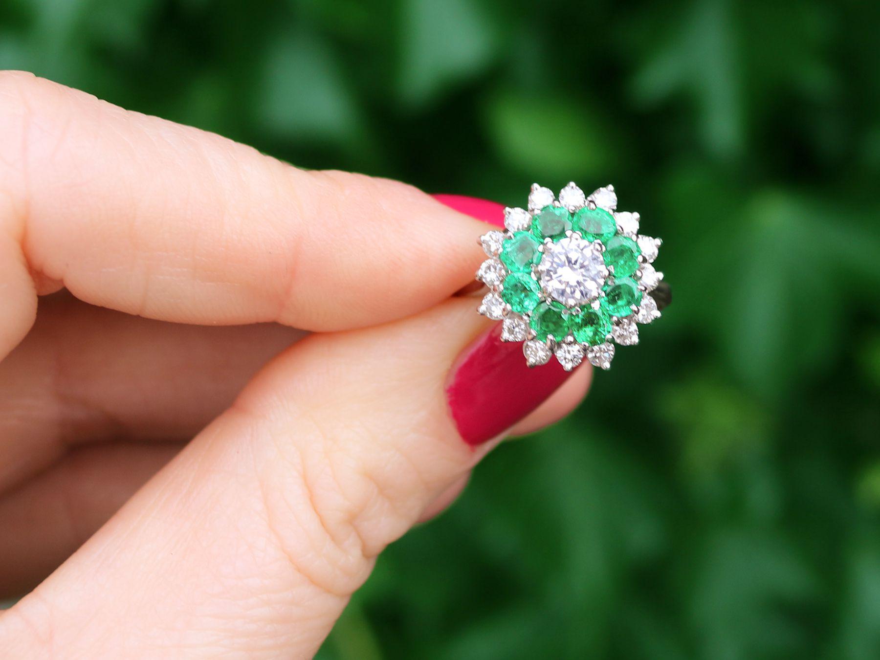 A fine and impressive vintage 0.98 carat emerald and 1.23 carat diamond, 18 karat white gold cocktail ring; part of our diverse range of gemstone jewelry

This impressive emerald cluster ring has been crafted in 18k white gold.

The substantial