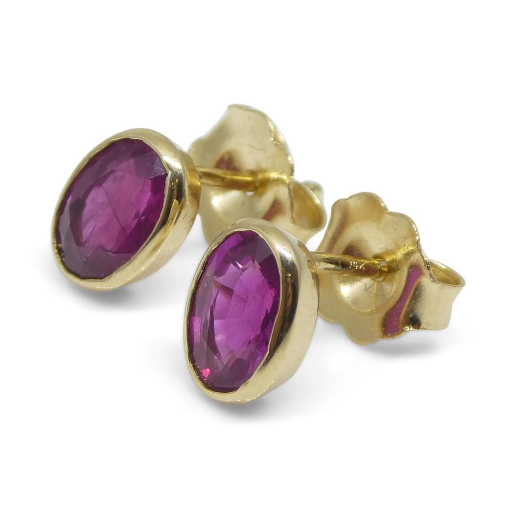 Brilliant Cut 1.23ct Oval Red Ruby Stud Earrings set in 14k Yellow Gold For Sale