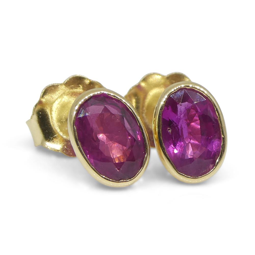 1.23ct Oval Red Ruby Stud Earrings set in 14k Yellow Gold For Sale 2