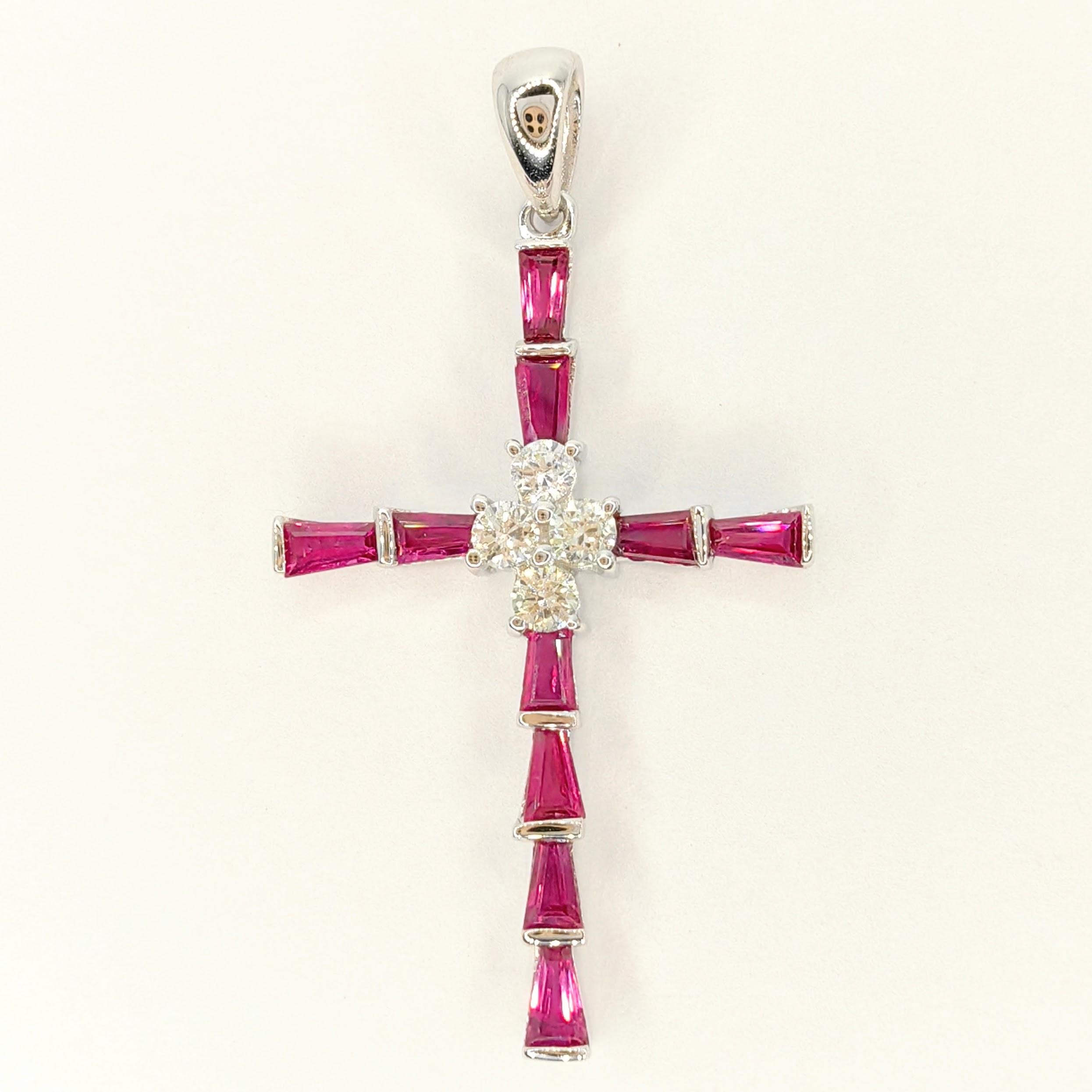Introducing our exquisite 1.22ct Ruby & Diamond Cross Pendant Necklace in 18K White Gold. This stunning piece of jewelry combines the timeless elegance of pigeon blood rubies and diamonds, creating a symbol of faith and beauty.

The cross pendant