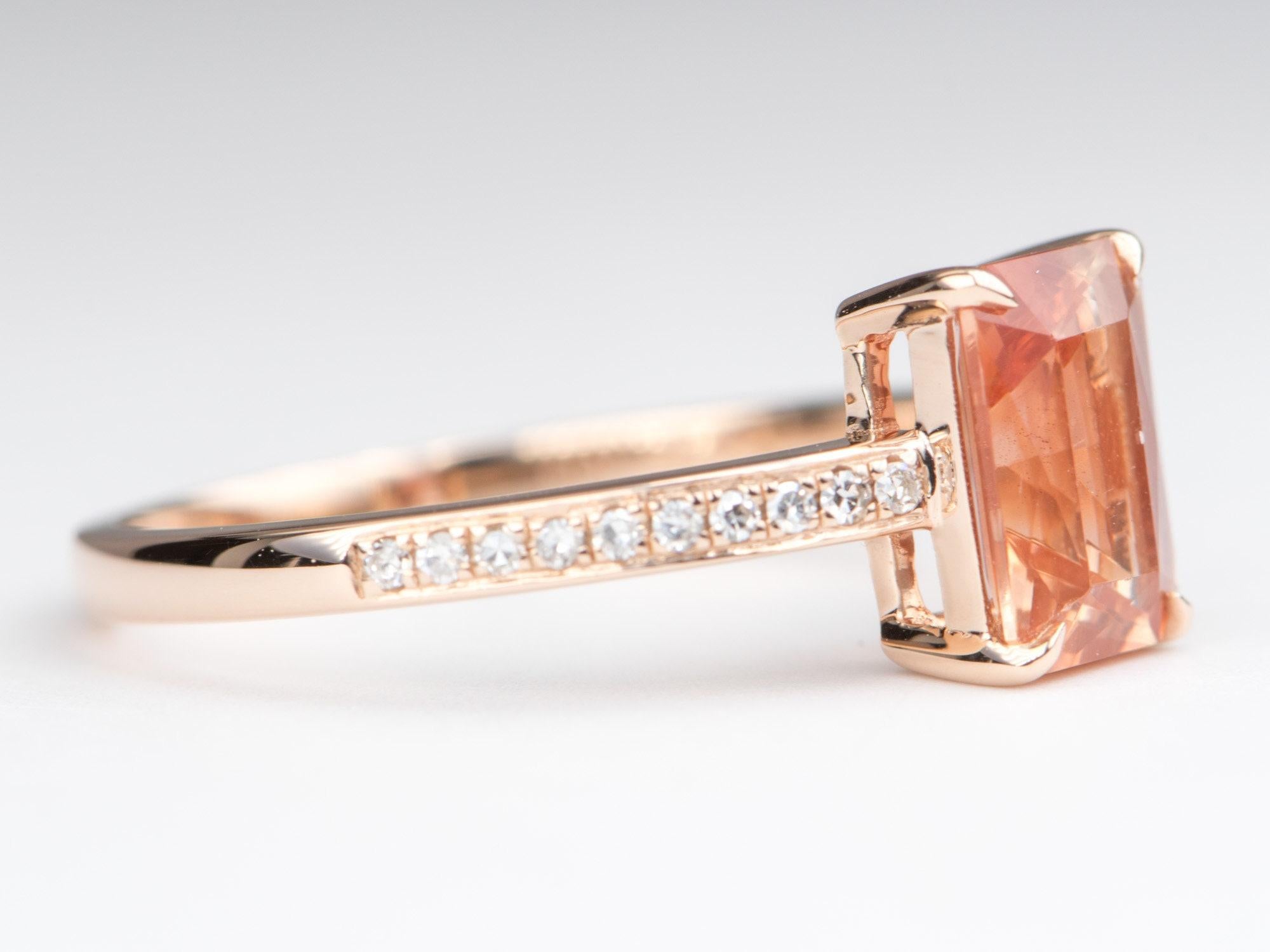 ♥ Solid 14K rose gold ring set with an rectangle-shaped reddish orange Oregon sunstone in the center with a diamond pave band
♥ The overall setting measures 6.2mm wide, 8.1mm in length, and sits 4.2mm tall from the finger

♥ Ring size: US Size 7