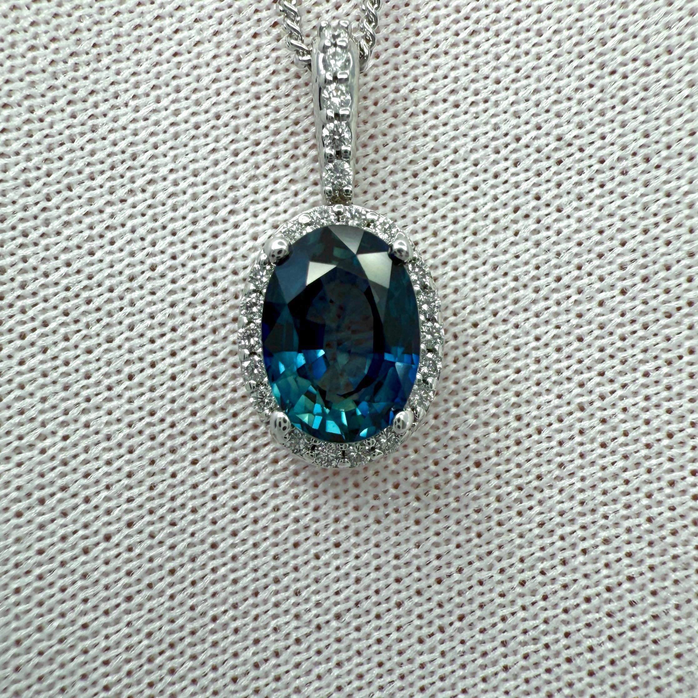 Natural Vivid Blue Oval Cut Sapphire And Diamond 14k White Gold Halo Pendant. 1.23 Total carat.

1.17 Carat natural sapphire with a fine vivid blue colour and an excellent oval cut.
This sapphire also has excellent clarity, a very clean stone.