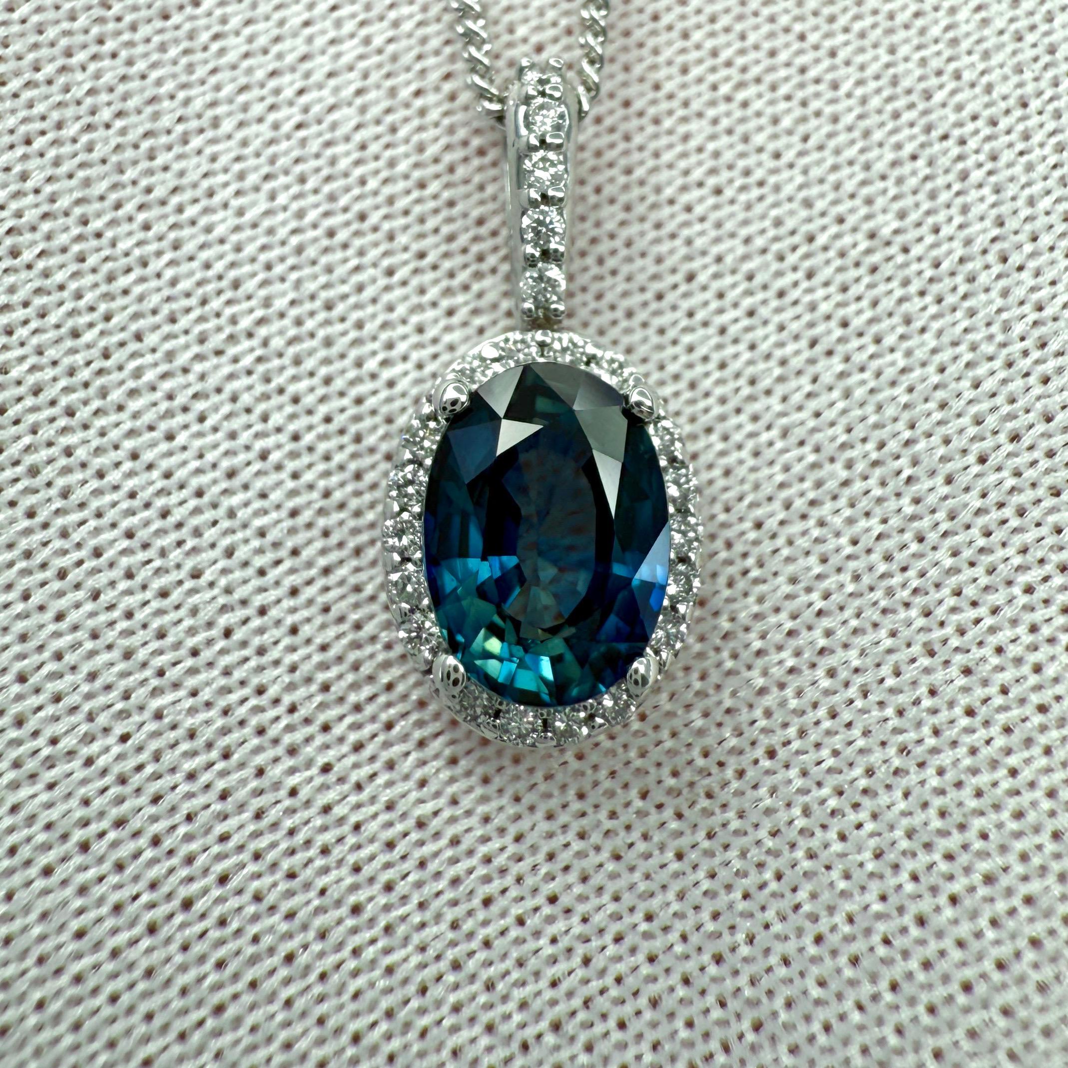 Women's or Men's 1.23ct Vivid Blue Oval Cut Sapphire And Diamond 14k White Gold Halo Pendant For Sale