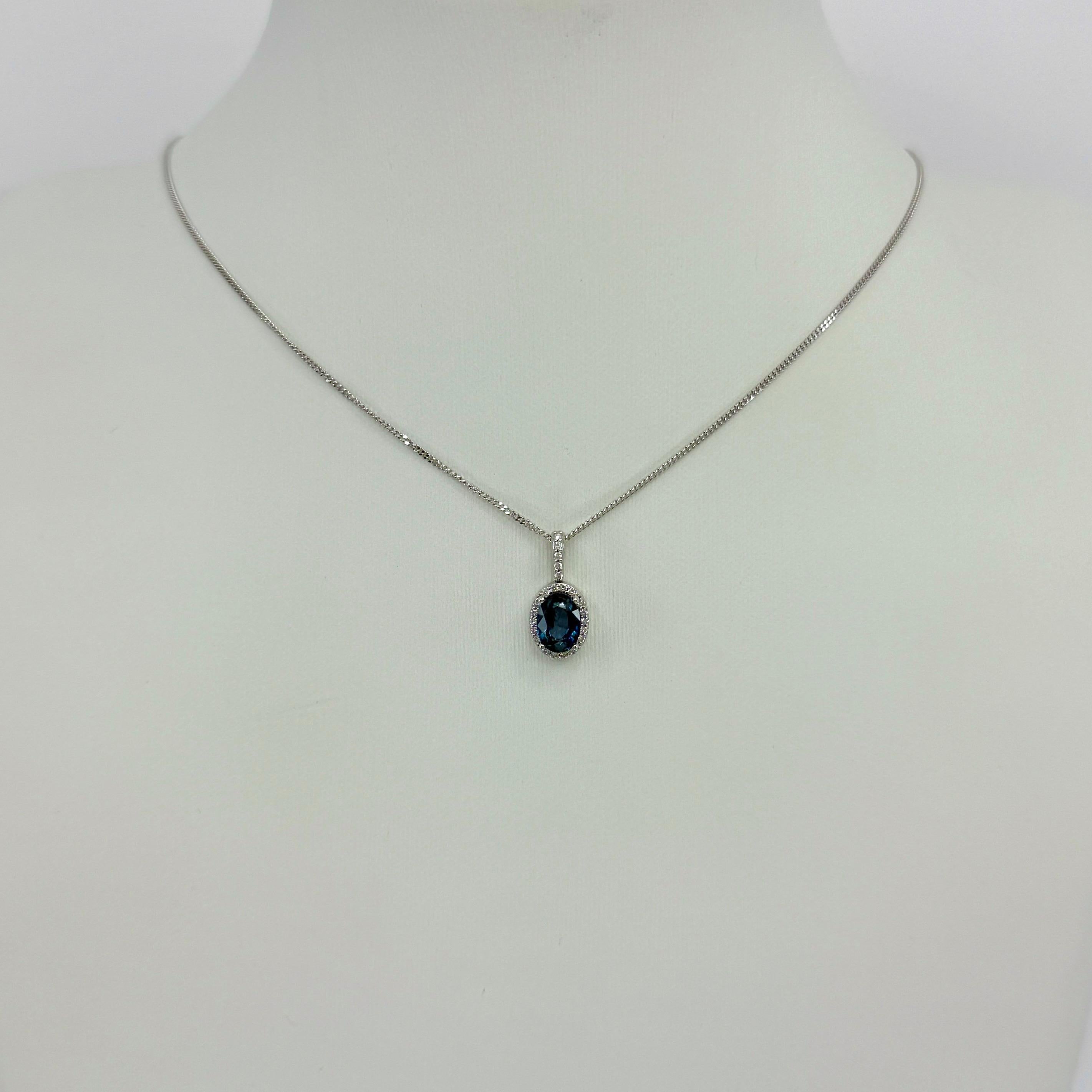 1.23ct Vivid Blue Oval Cut Sapphire And Diamond 14k White Gold Halo Pendant For Sale 1