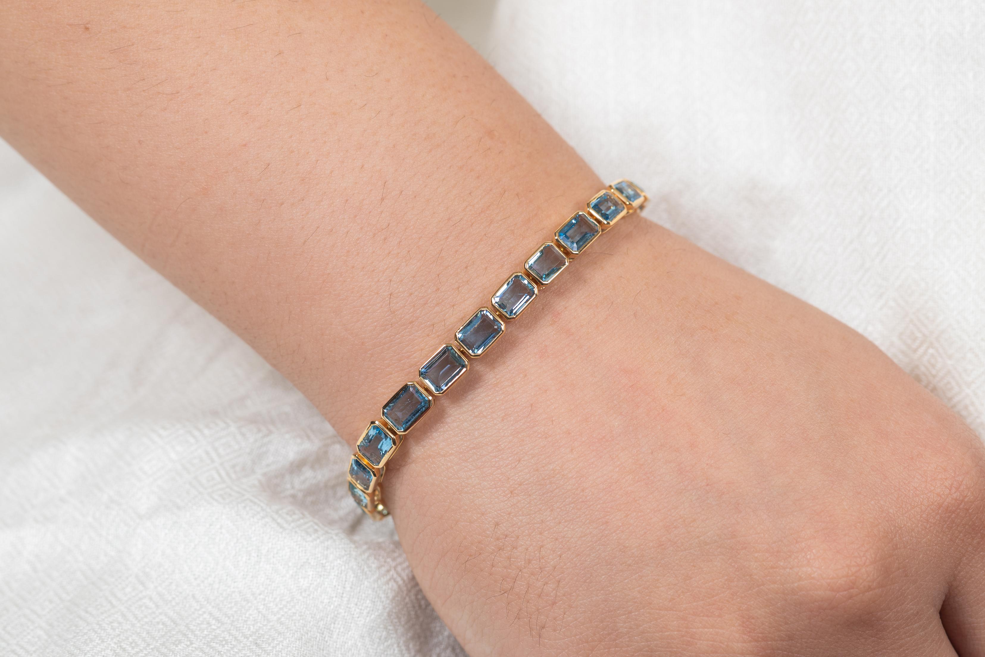 Aquamarine bracelet in 18K Gold. It has a perfect octagon cut gemstone to make you stand out on any occasion or an event. 
A tennis bracelet is an essential piece of jewelry when it comes to your wedding day. The sleek and elegant style complements