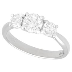Retro 1.24 Carat Diamond and Platinum Three-Stone Engagement Ring