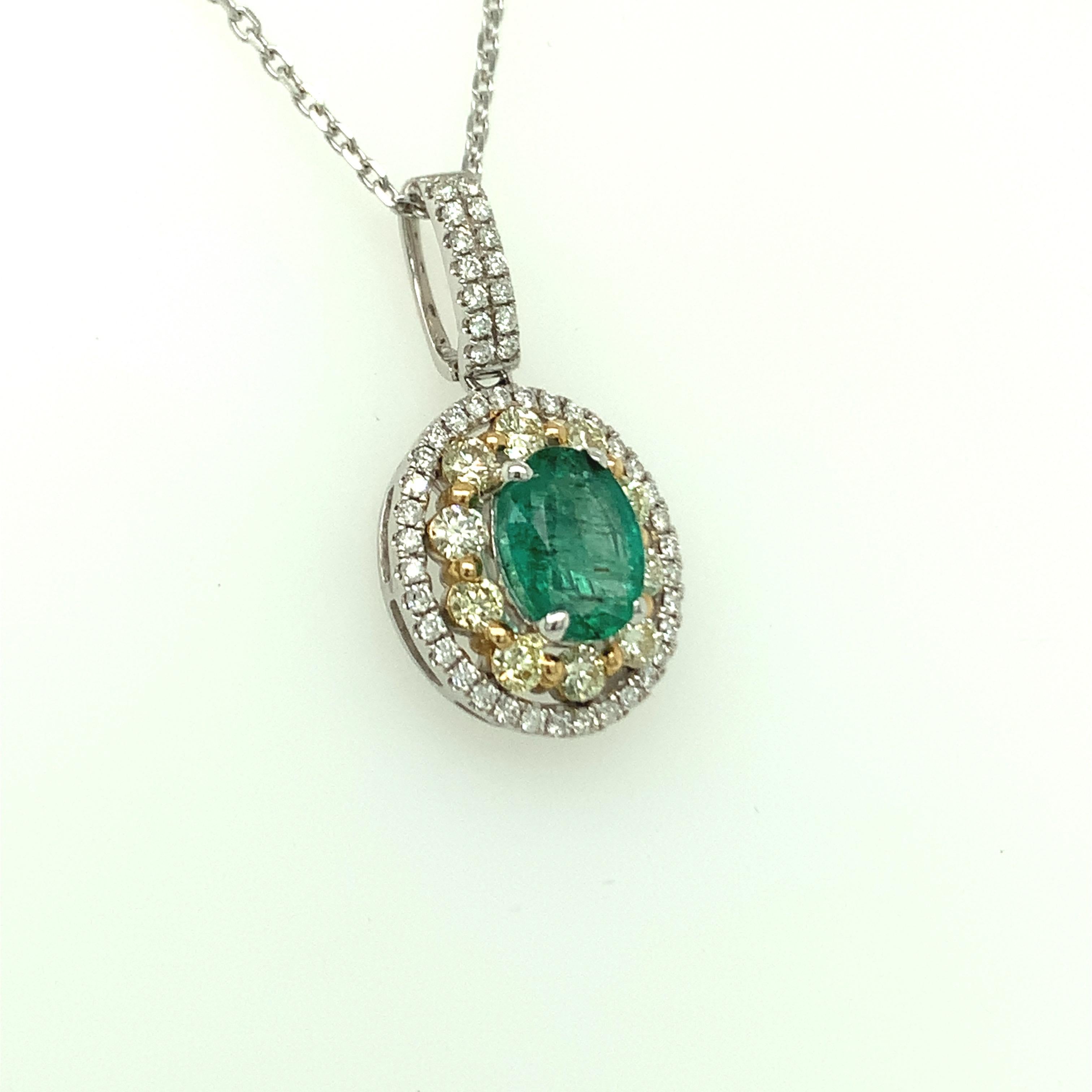Oval Cut 1.24 Carat Emerald Pendant with Yellow and White Diamond Set in Two Tone Gold  For Sale