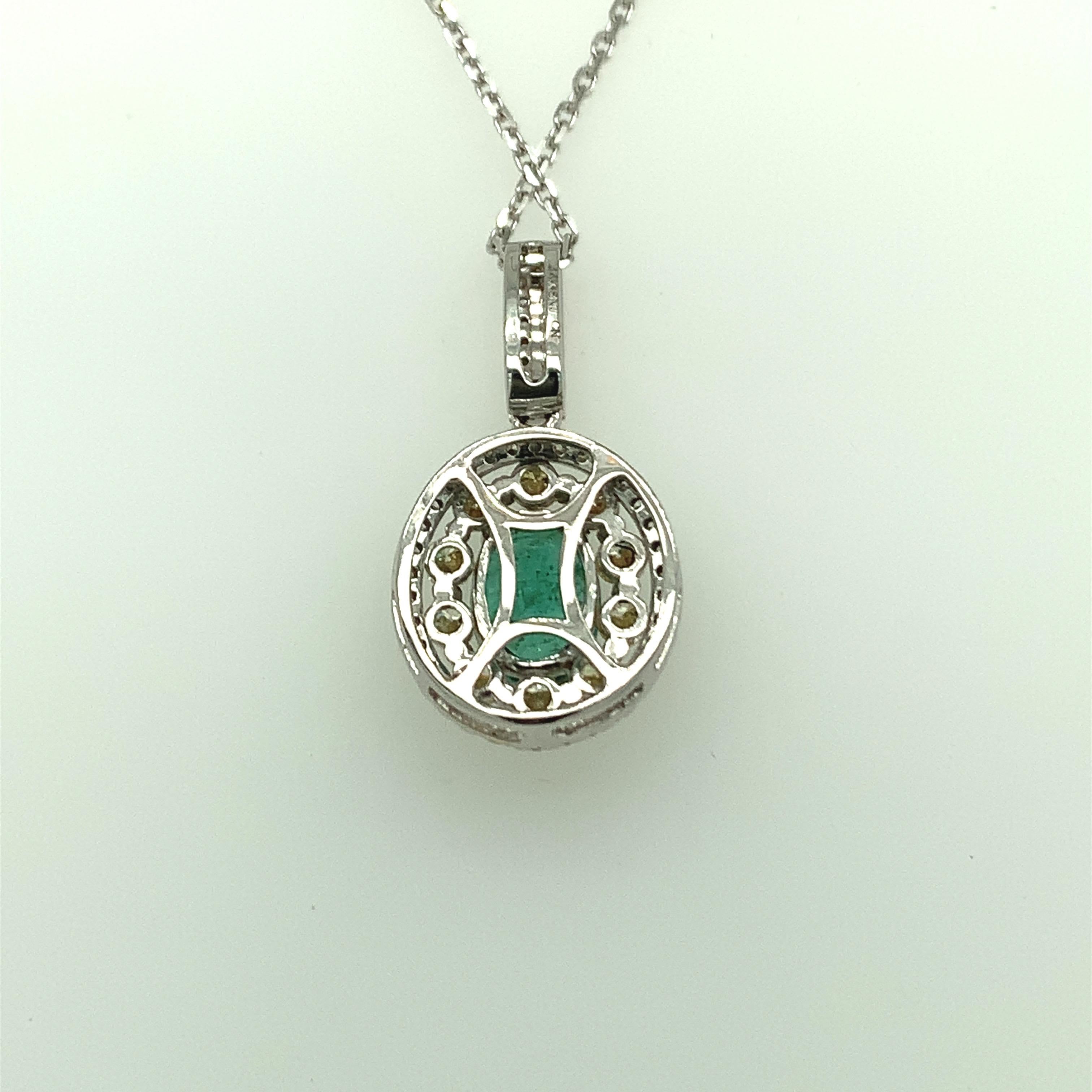 1.24 Carat Emerald Pendant with Yellow and White Diamond Set in Two Tone Gold  For Sale 1