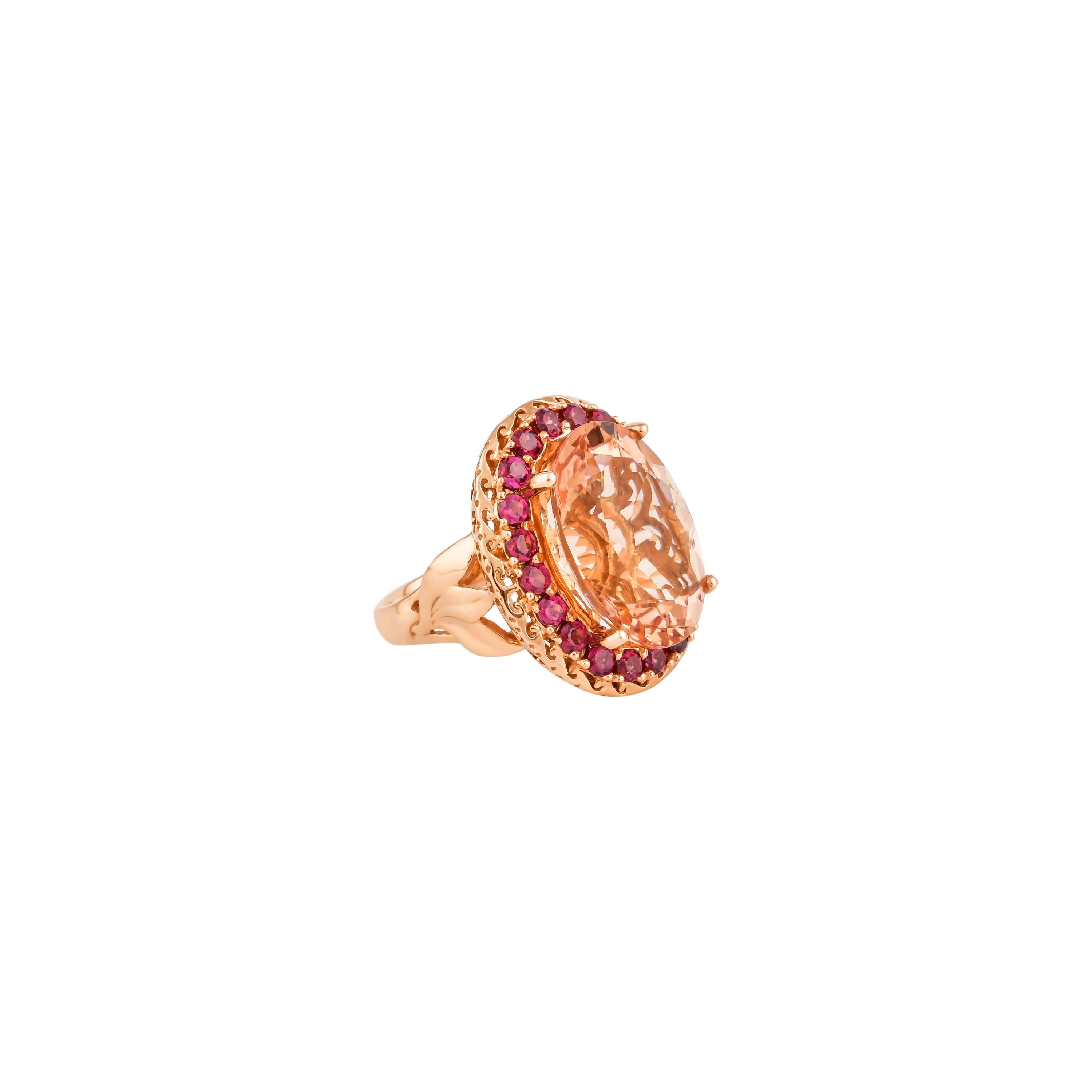 This collection features an array of magnificent morganites! Accented with diamonds these rings are made in rose gold and present a classic yet elegant look. 

Classic morganite ring in 18K rose gold with rhodolite and diamonds. 

Morganite: 12.4