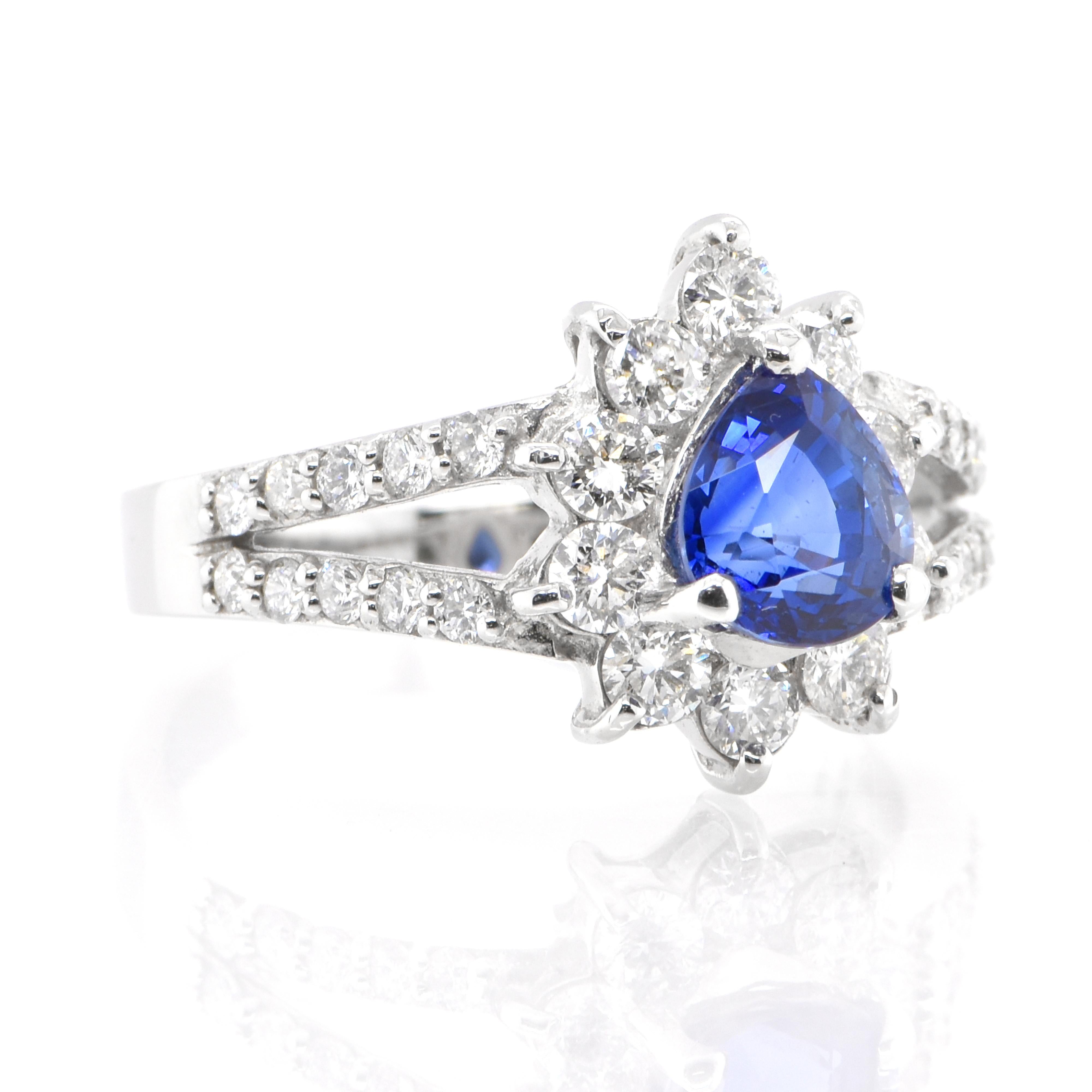 Modern 1.24 Carat Natural Blue Sapphire and Diamond Ring Set in Platinum For Sale
