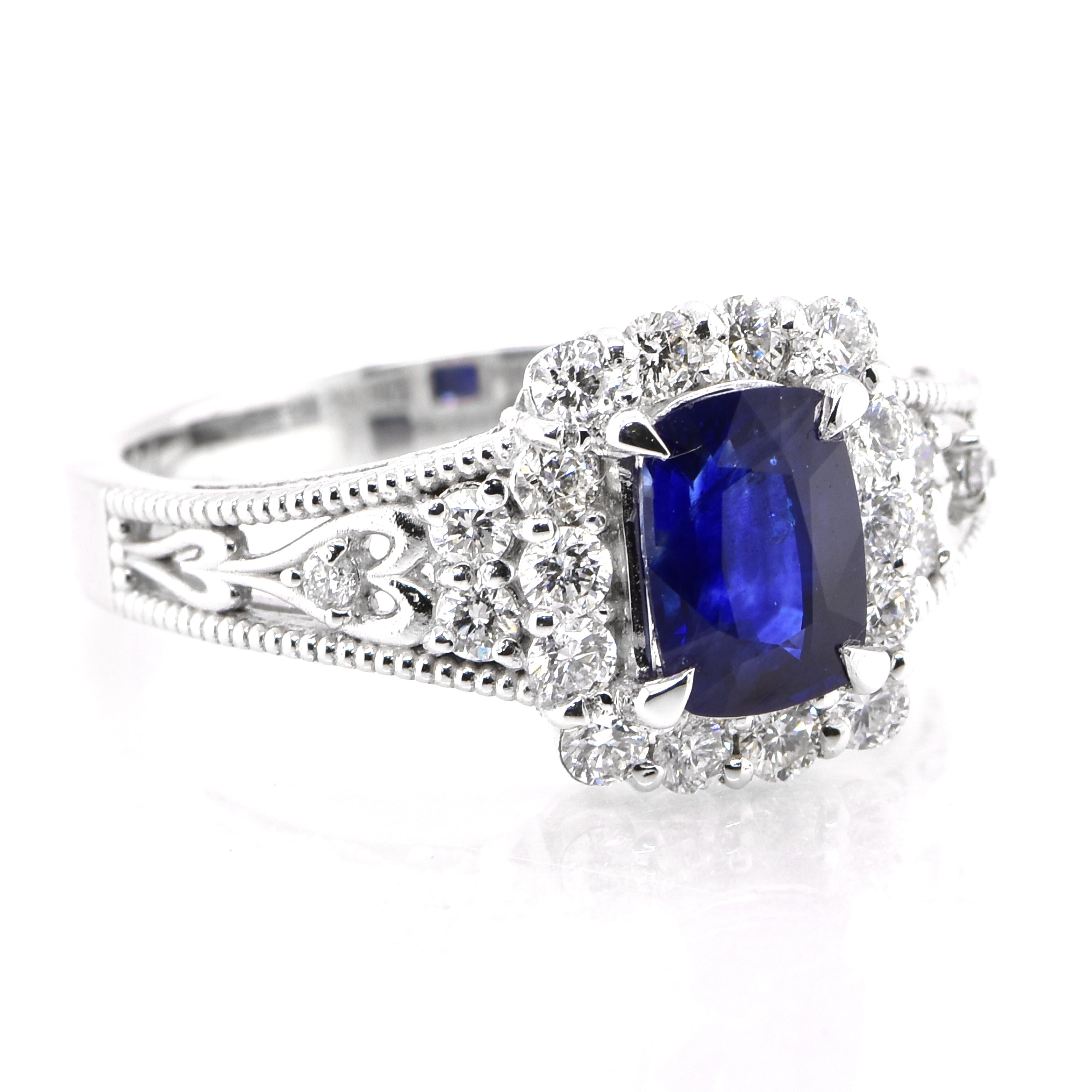Modern 1.24 Carat Natural Royal Blue Sapphire & Diamond Ring set in Platinum For Sale
