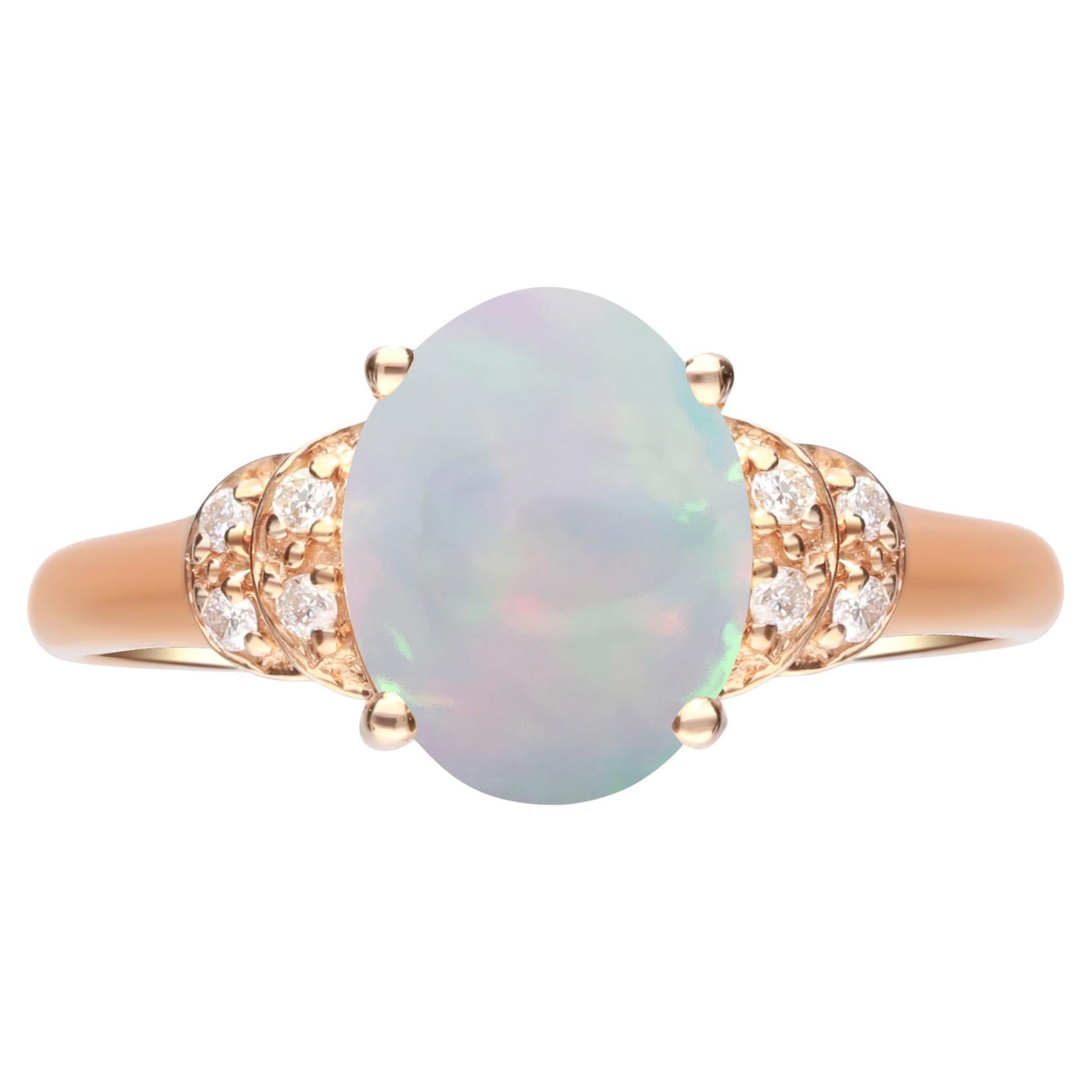 1.24 Carat Opal Oval Cab and Diamond 10K Rose Gold Classic Ring For Sale