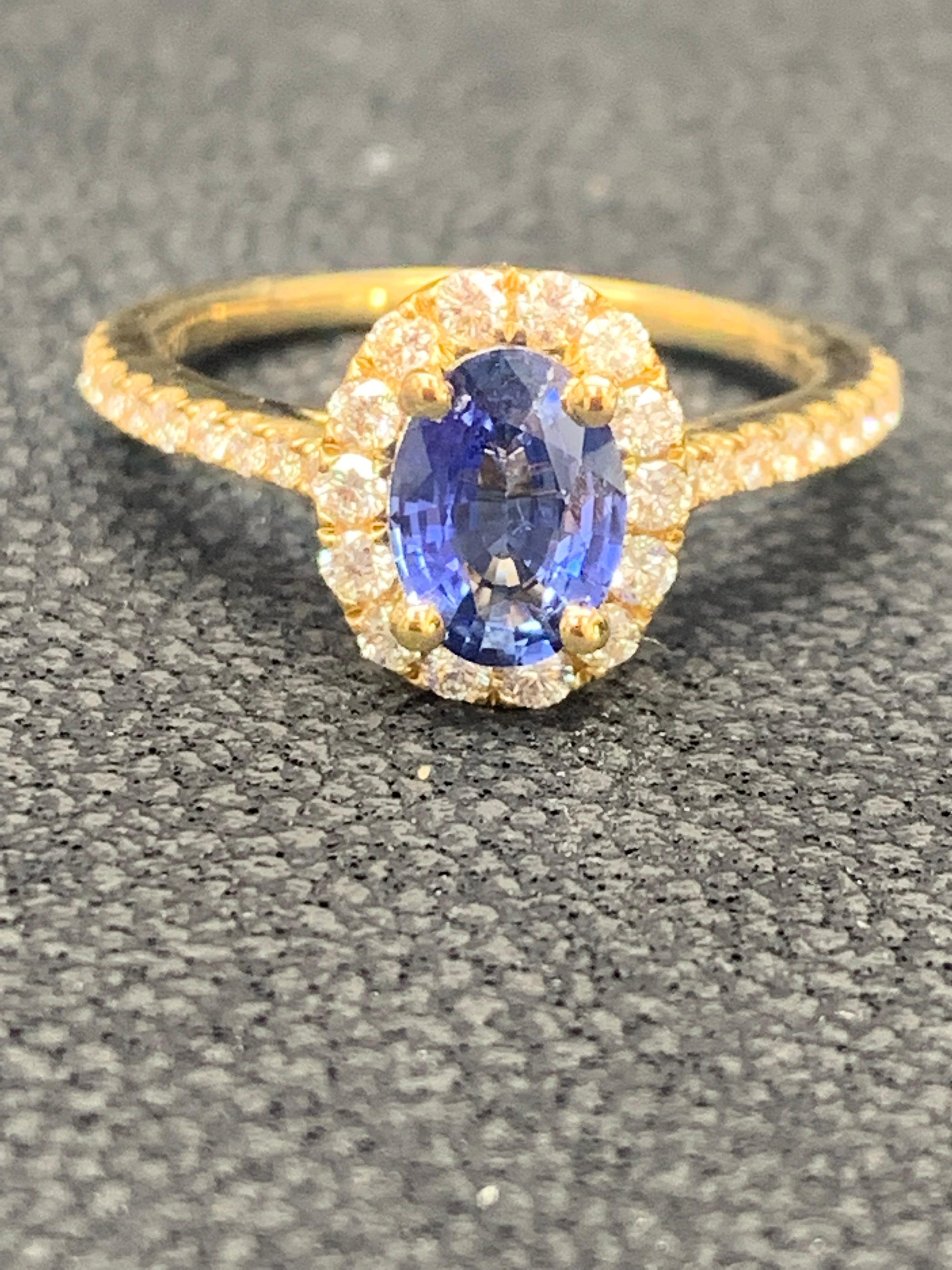1.24 Carat Oval Sapphire and Diamond Halo Engagement Ring in 18K Yellow Gold For Sale 7