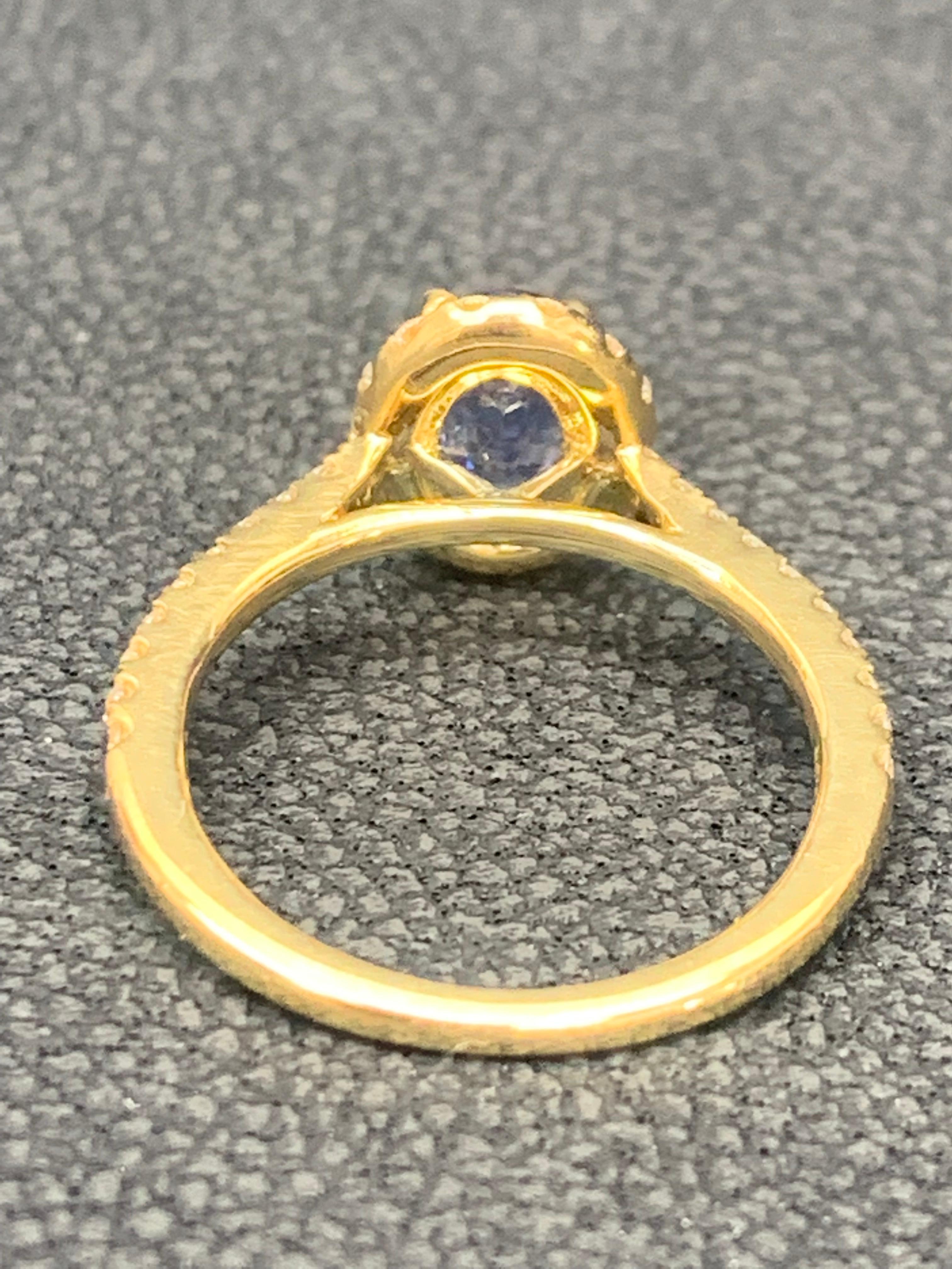1.24 Carat Oval Sapphire and Diamond Halo Engagement Ring in 18K Yellow Gold For Sale 9