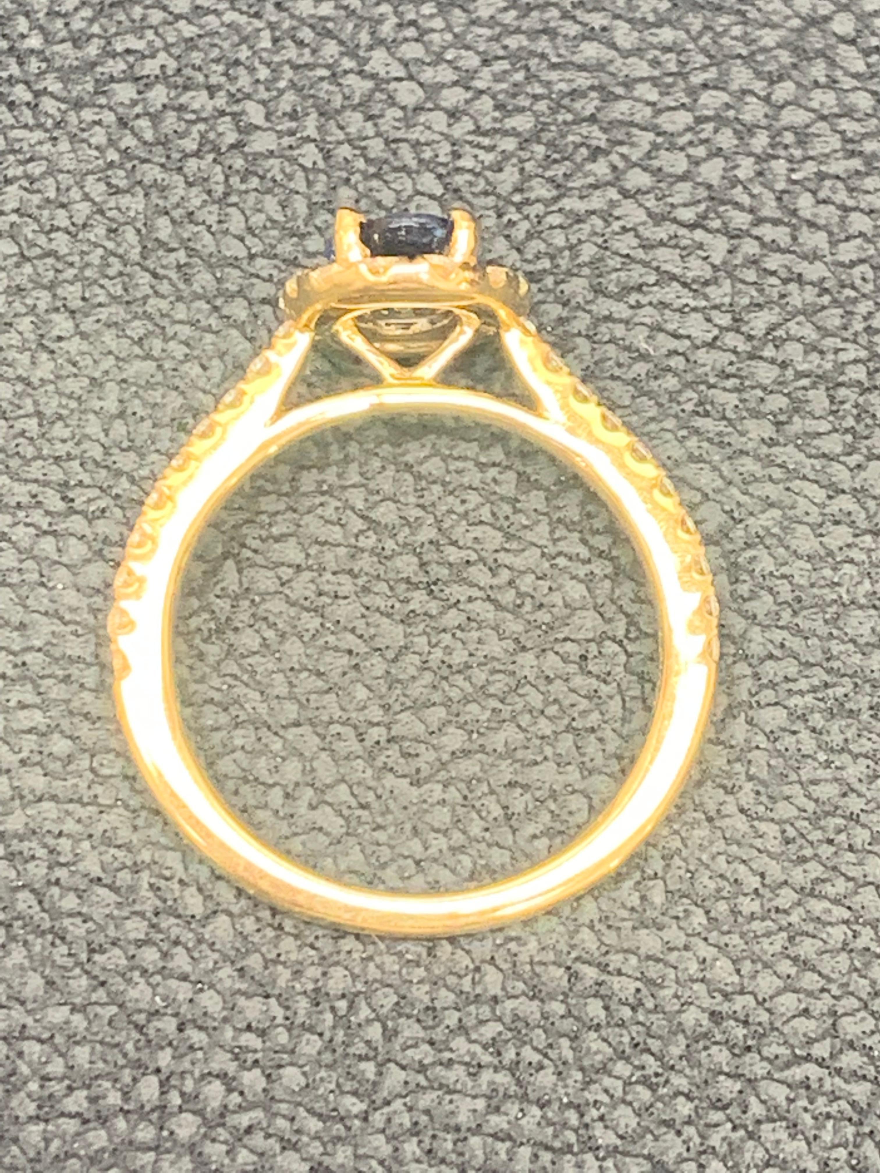 1.24 Carat Oval Sapphire and Diamond Halo Engagement Ring in 18K Yellow Gold For Sale 10