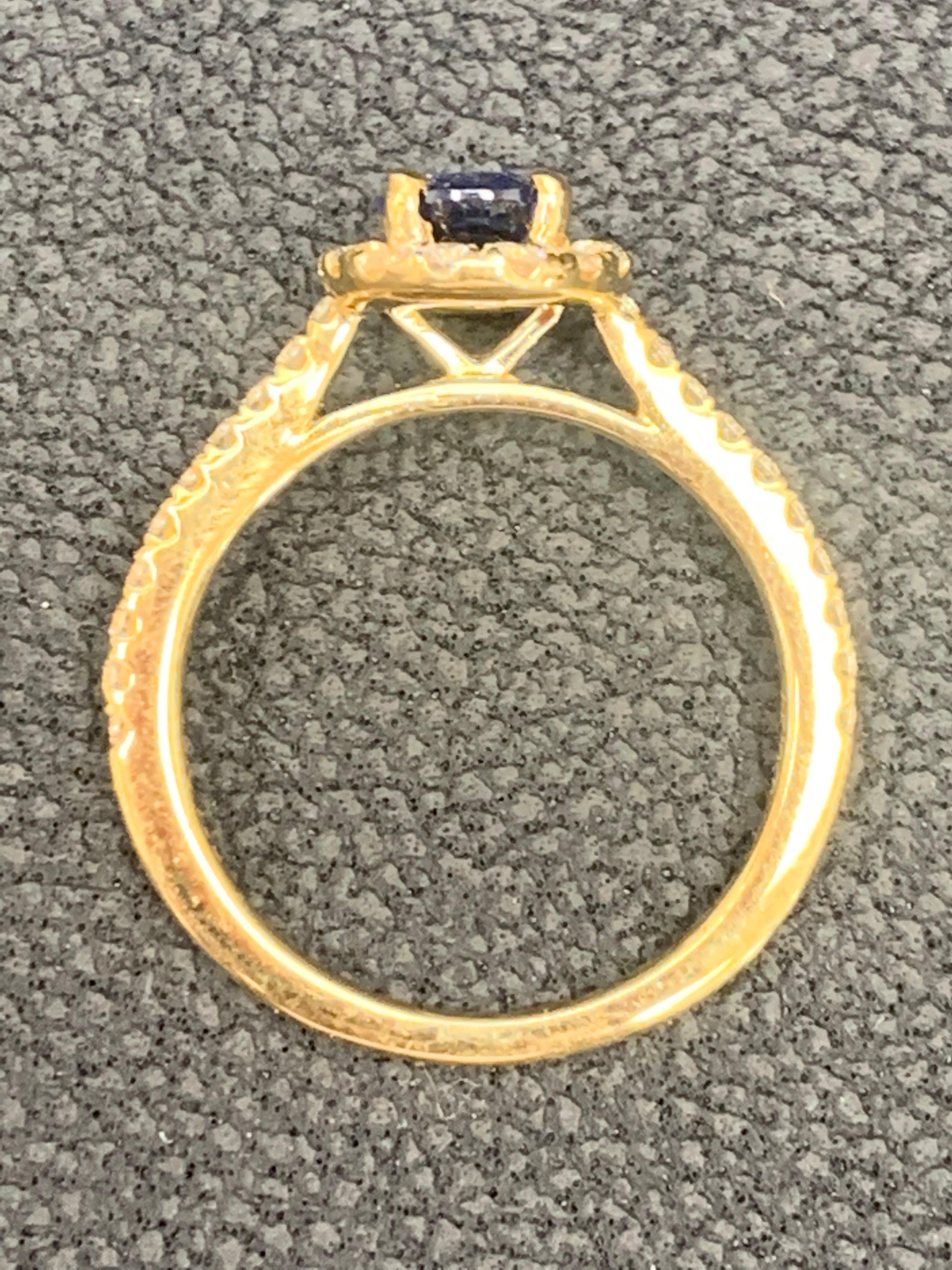 1.24 Carat Oval Sapphire and Diamond Halo Engagement Ring in 18K Yellow Gold For Sale 11