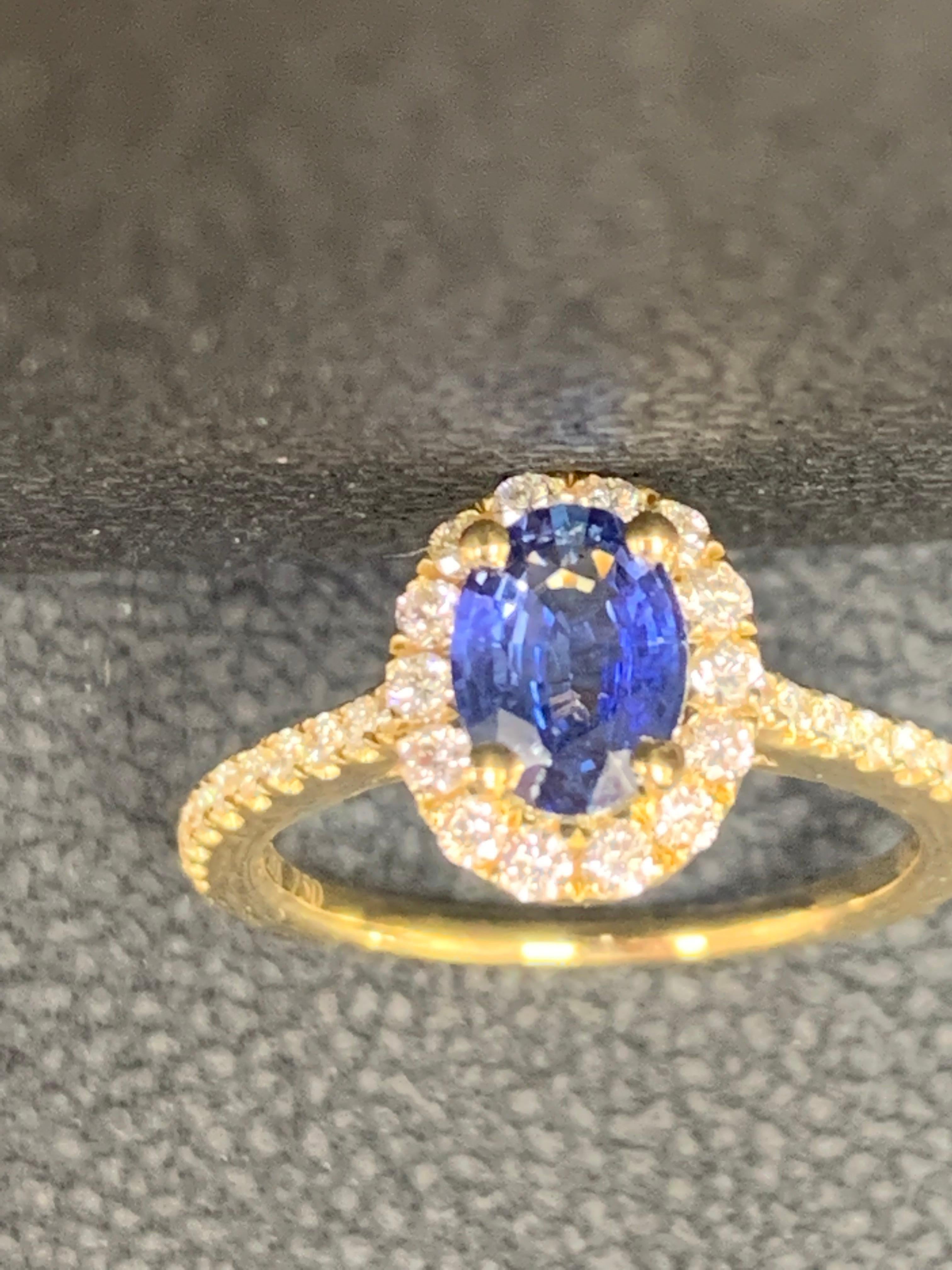 1.24 Carat Oval Sapphire and Diamond Halo Engagement Ring in 18K Yellow Gold For Sale 13