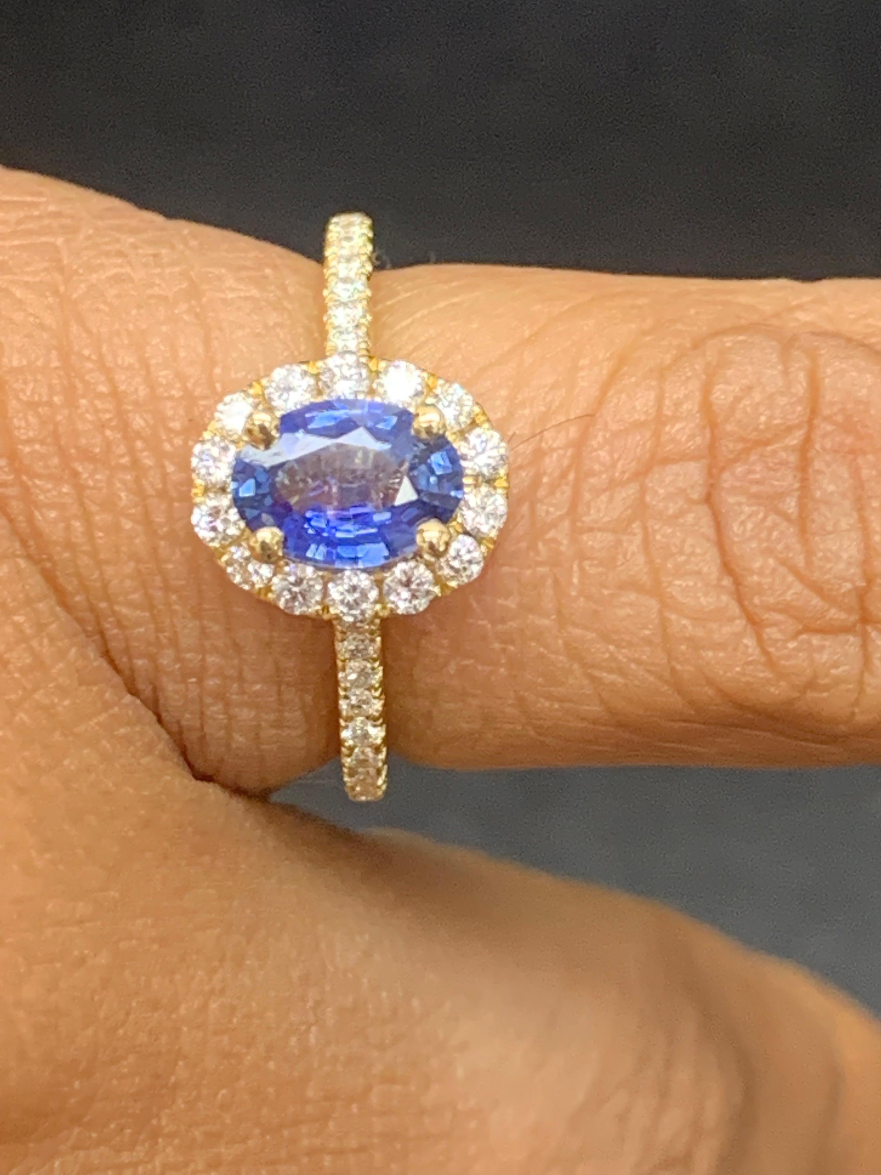 1.24 Carat Oval Sapphire and Diamond Halo Engagement Ring in 18K Yellow Gold For Sale 2