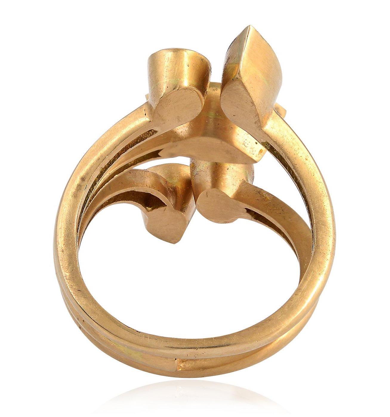This ring has been meticulously crafted from 18-karat yellow gold & sterling silver. It is set in 1.24 carats of rose cut diamonds. Also available in rose gold.

The ring is a size 7 and may be resized to larger or smaller upon request. 
FOLLOW 