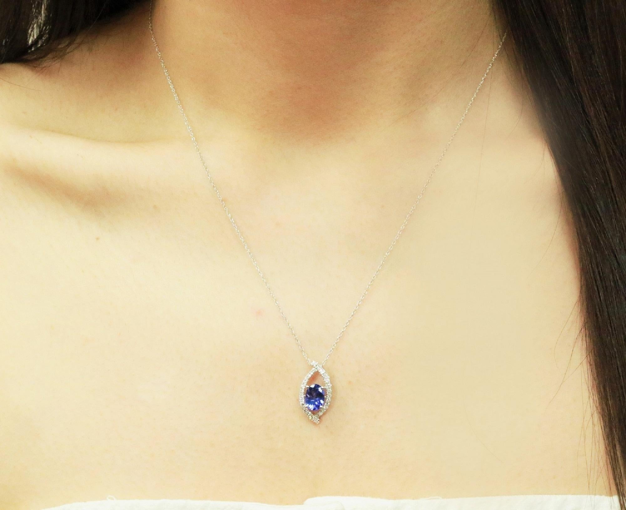 1.24 Carat Tanzanite Oval Cut, Diamond Accents 14K White Gold Pendant In New Condition In New York, NY