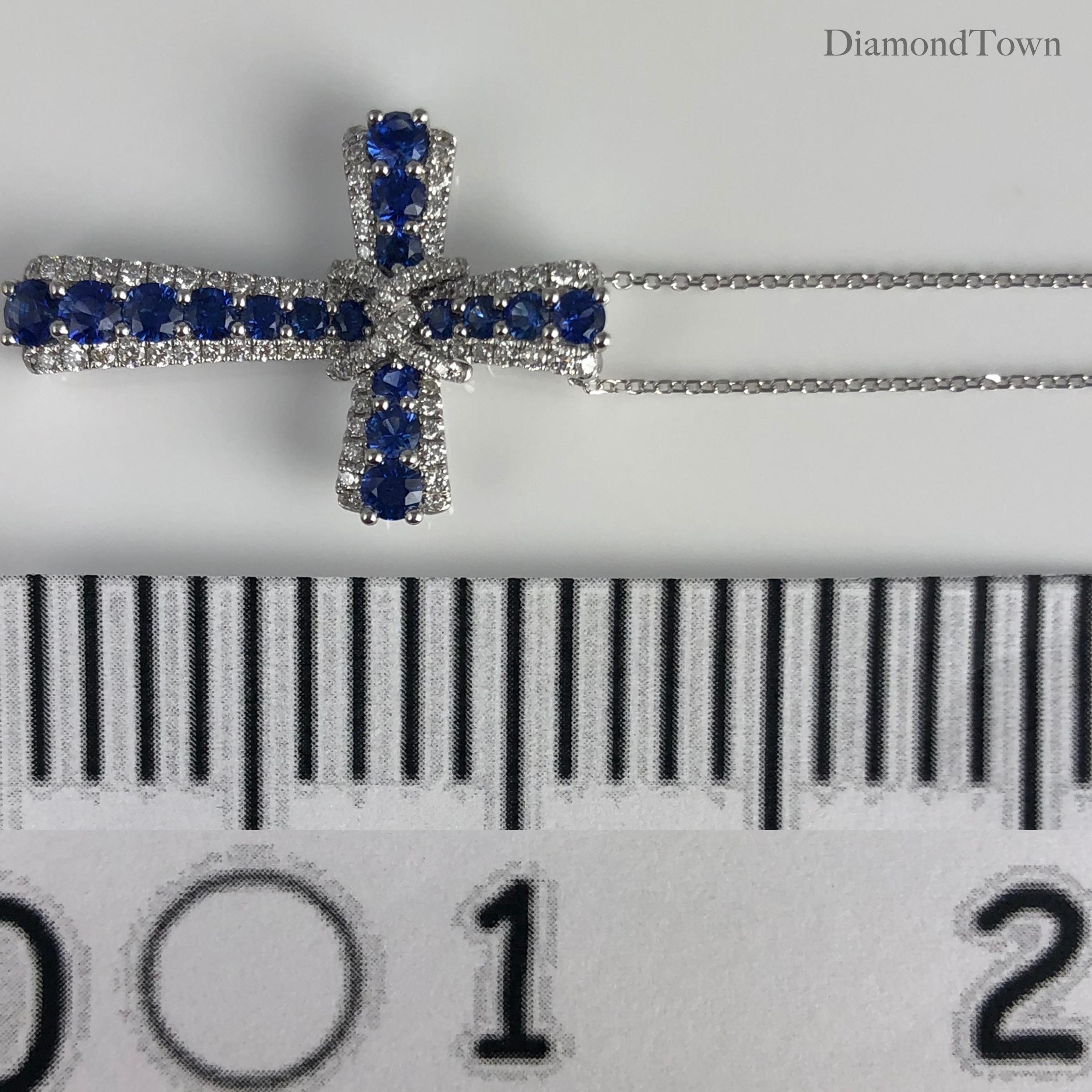 1.24 Carat Vivid Blue Sapphire and Diamond Embellished Cross Pendant In New Condition In New York, NY