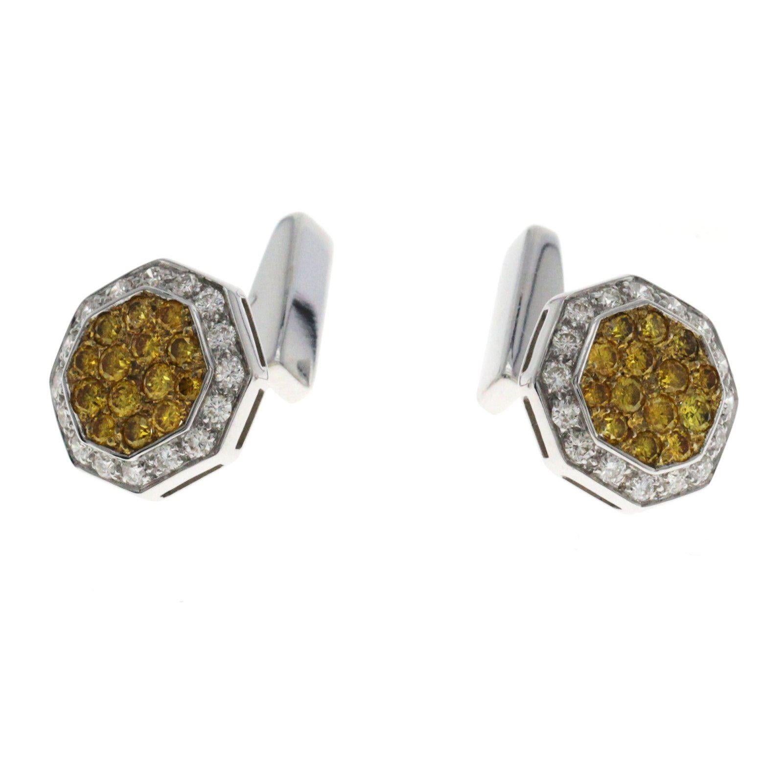 Height: 13.5 mm
Width: 24.5 mm
Metal:18K White Gold
Hallmarks: 750
Total Weight: 9.9 Grams
Stone Type: 1.24 CT Natural I2 Yellow Diamonds & 0.44 CT I1 Diamonds
Condition: New 
Estimated Retail Price: $7800
Stock Number: 190-00340