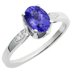 1.24 cts Natural Tanzanite 
0.11 cts Diamonds 18K White Gold Ring