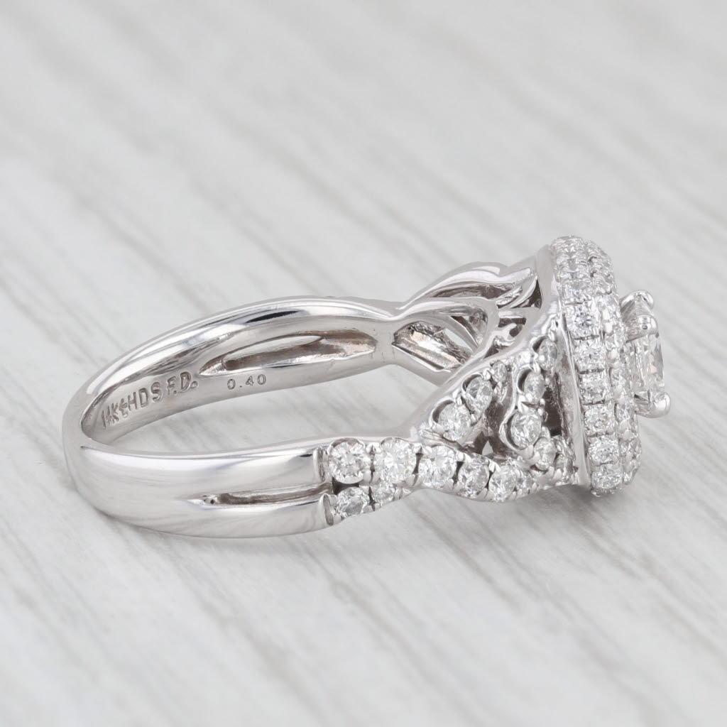 Gemstone Information:
- Natural Diamond Center-
Total Carats - 0.36 ctw
Cut - Radiant Star (Proprietary Cut - Square)
Color - G
Clarity - VS2 

- Natural Diamond Accents-
Total Carats - 0.88 ctw
Cut - Round Brilliant
Color - G-I
Clarity -