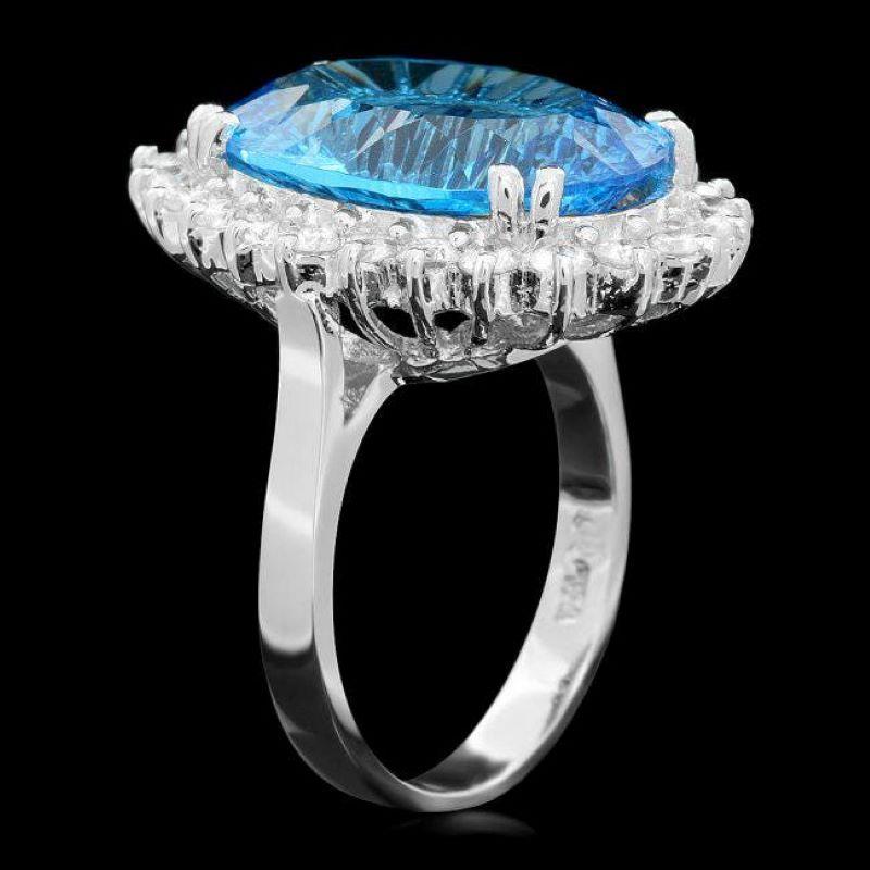 12.bague en or blanc massif 14K avec topaze bleue naturelle de 40 carats et diamant

Le poids total de la topaze bleue naturelle est de : Environ 11,40 carats 

Topaze bleue Mesures : Environ 17.00 x 13.00mm

Diamants ronds naturels Poids : Environ