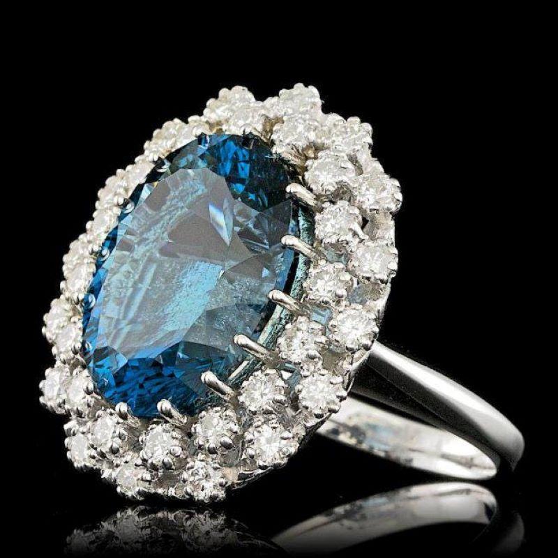 12.40 Carats Natural Blue Topaz and Diamond 14K Solid White Gold Ring

Total Natural Blue Topaz Weight is: Approx. 11.00 Carats 

Blue Topaz Measures: Approx. 16.00 x 12.00mm

Natural Round Diamonds Weight: Approx. 1.40 Carats (color G-H / Clarity