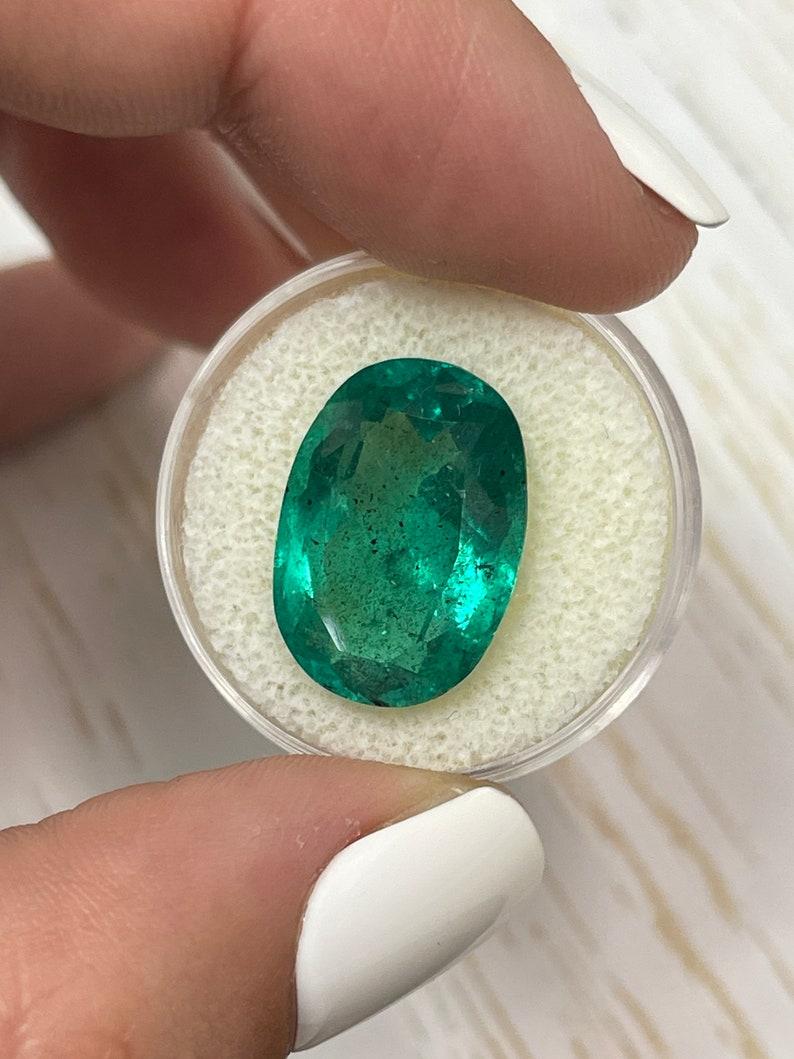 Modern 12.42 Carat Rich Green Colombian Emerald Oval Cut - May Birthstone Gem For Sale