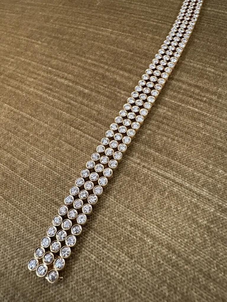 Round Cut 12.42 Carats Three Row Bezel Set Diamond Bracelet in 18k Yellow Gold For Sale